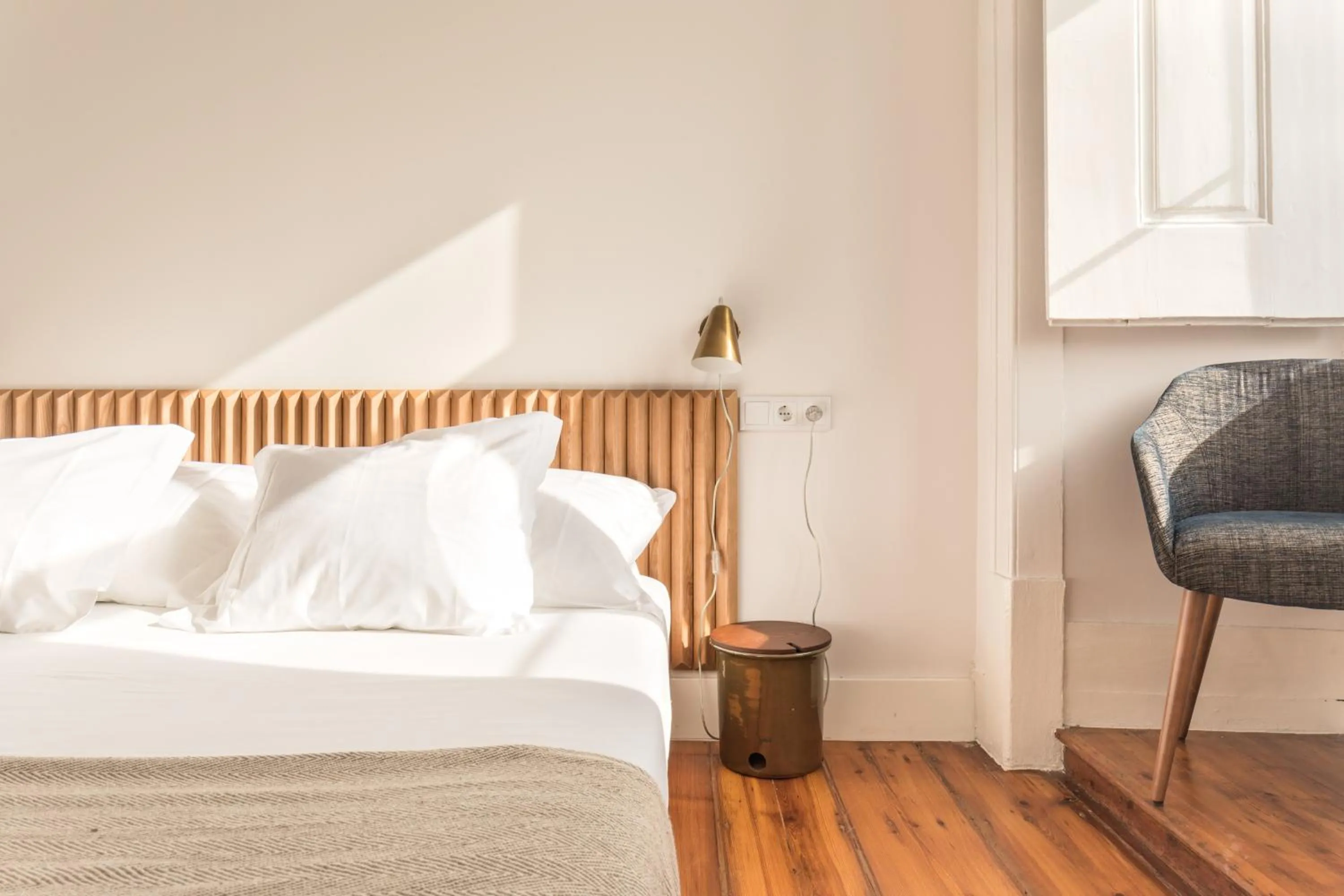 Bed in The Visionaire Apartments