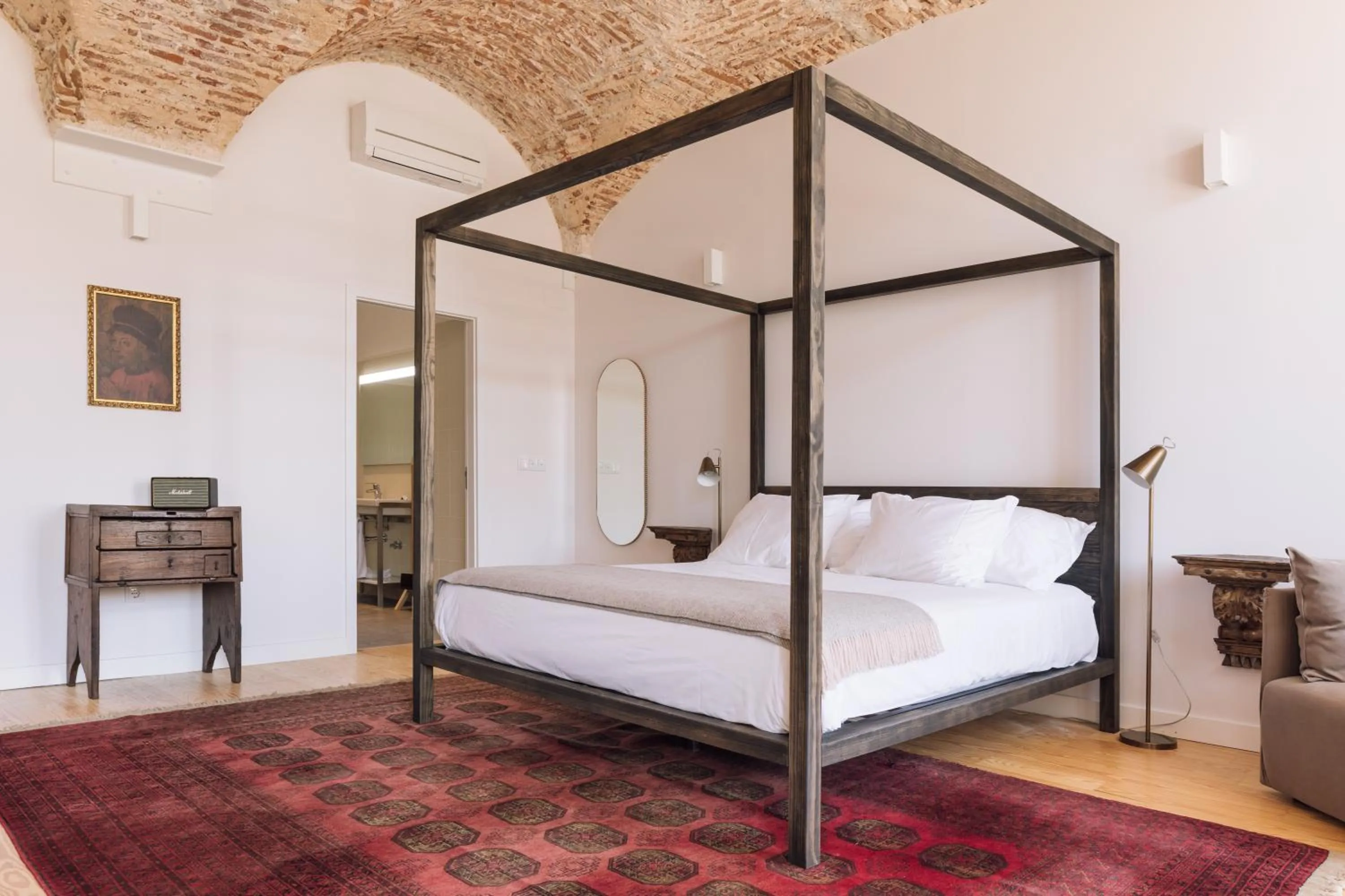 Bed in The Visionaire Apartments