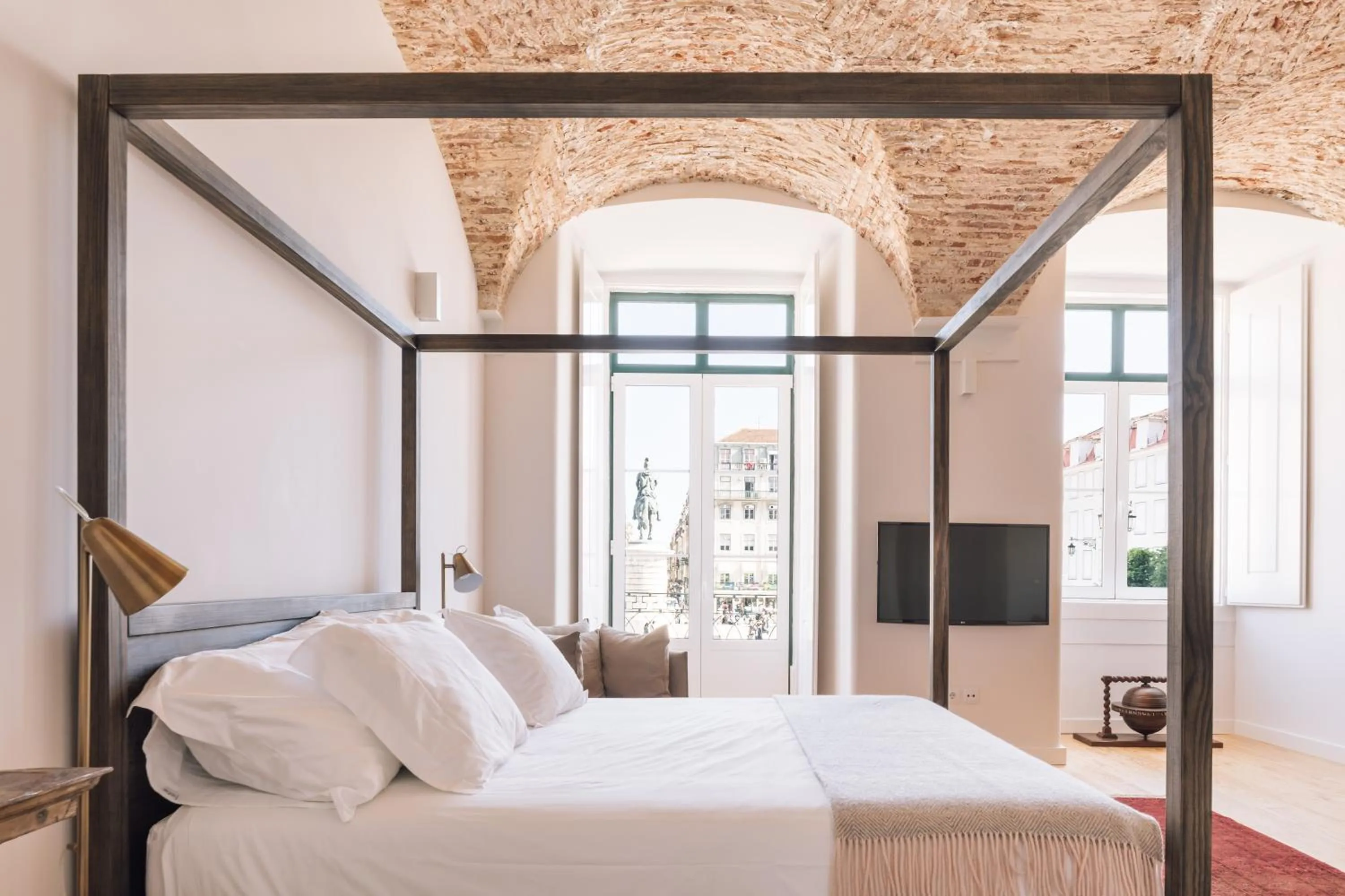 Bed in The Visionaire Apartments