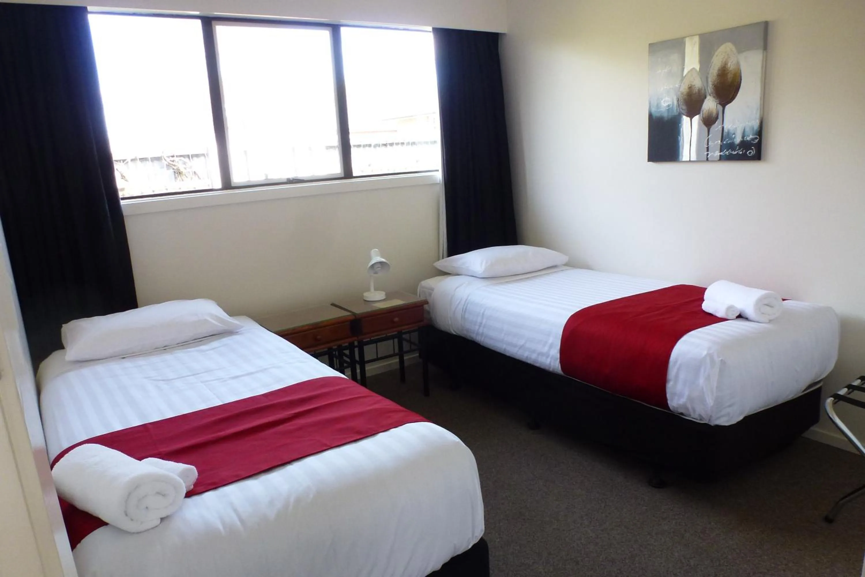 Bed in ASURE Adcroft Motel