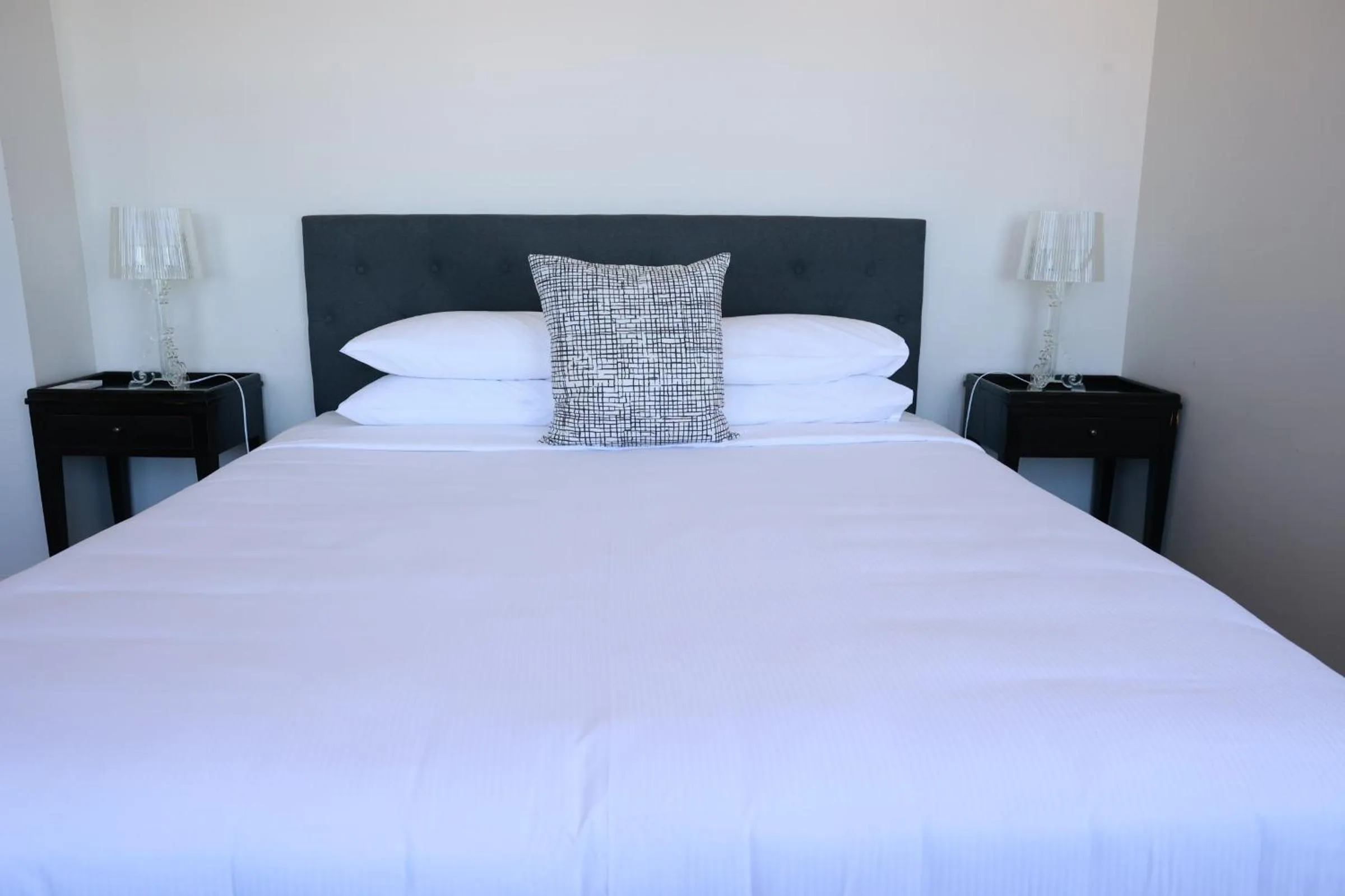 Bed in The Dome Boutique Apartments
