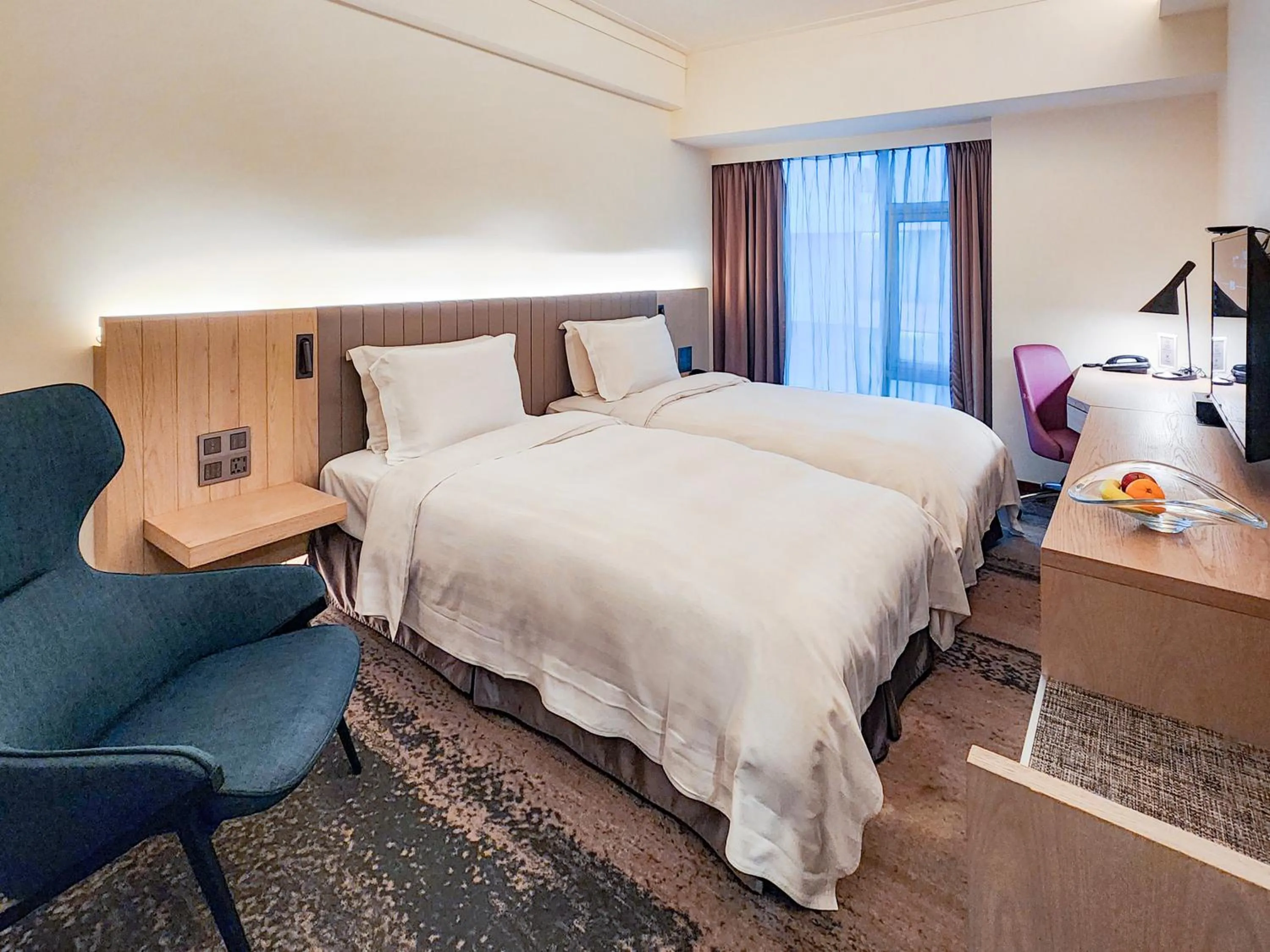 Bed in Howard Plaza Hotel Hsinchu