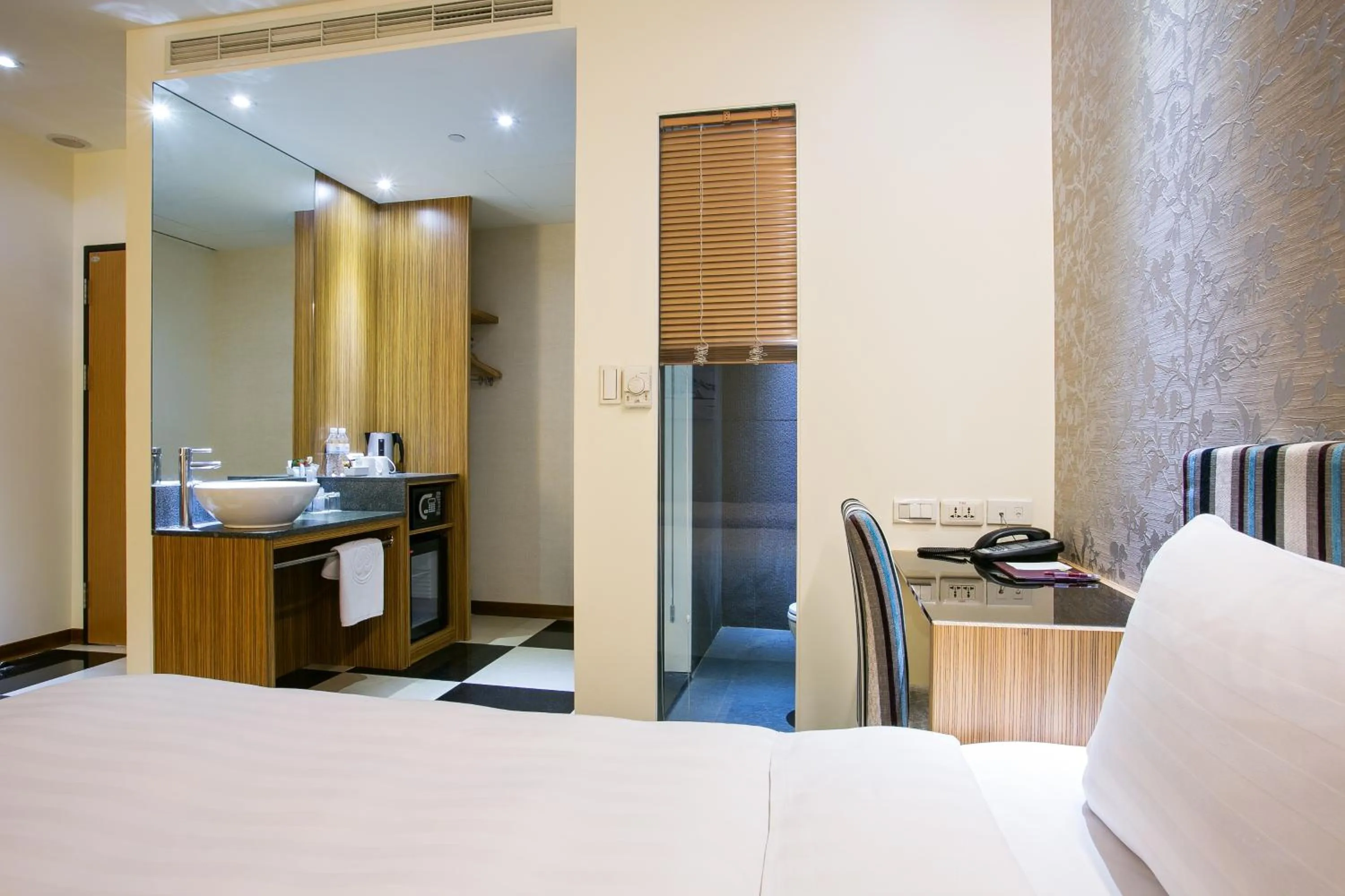 Bed in Howard Plaza Hotel Hsinchu