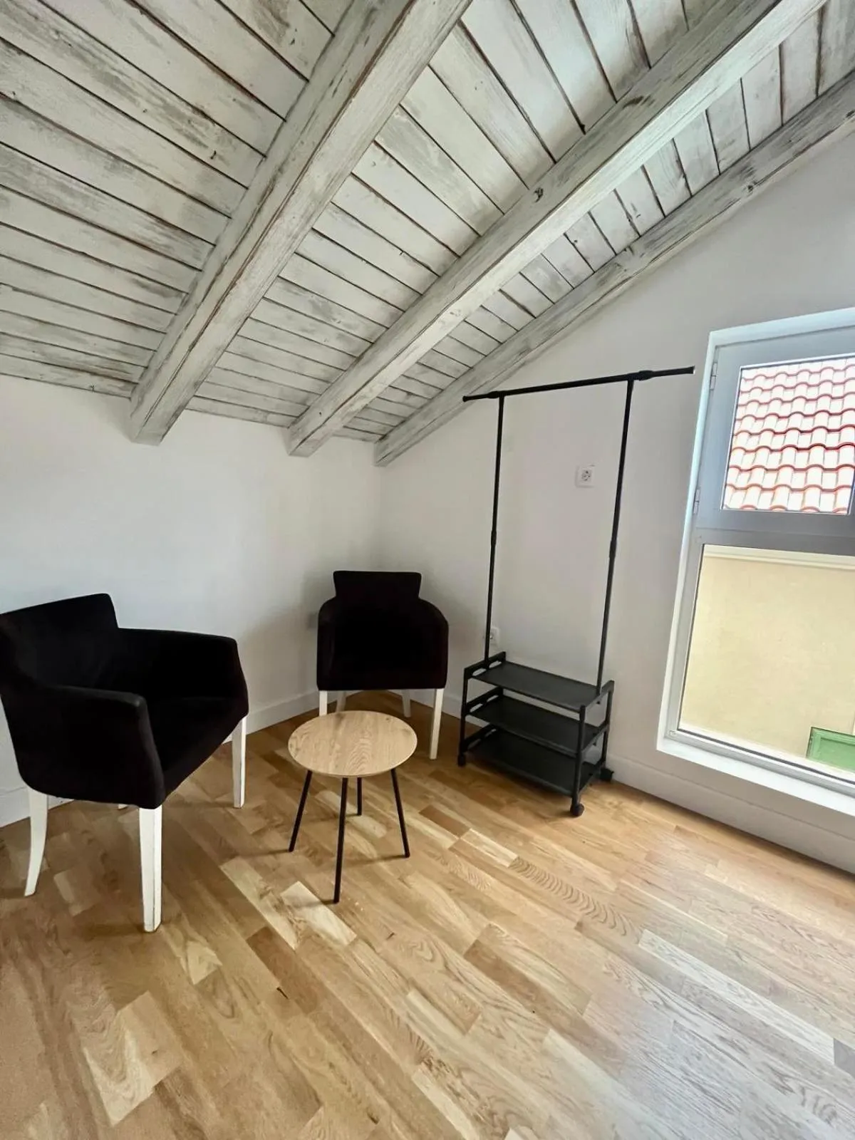 Seating area in Apartments & rooms - TIANIS - Self check-in