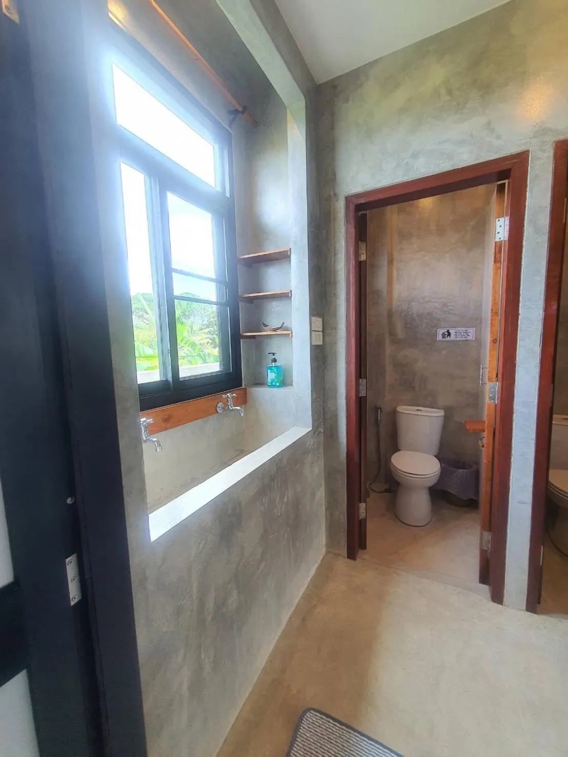 Toilet in Le Cocotier