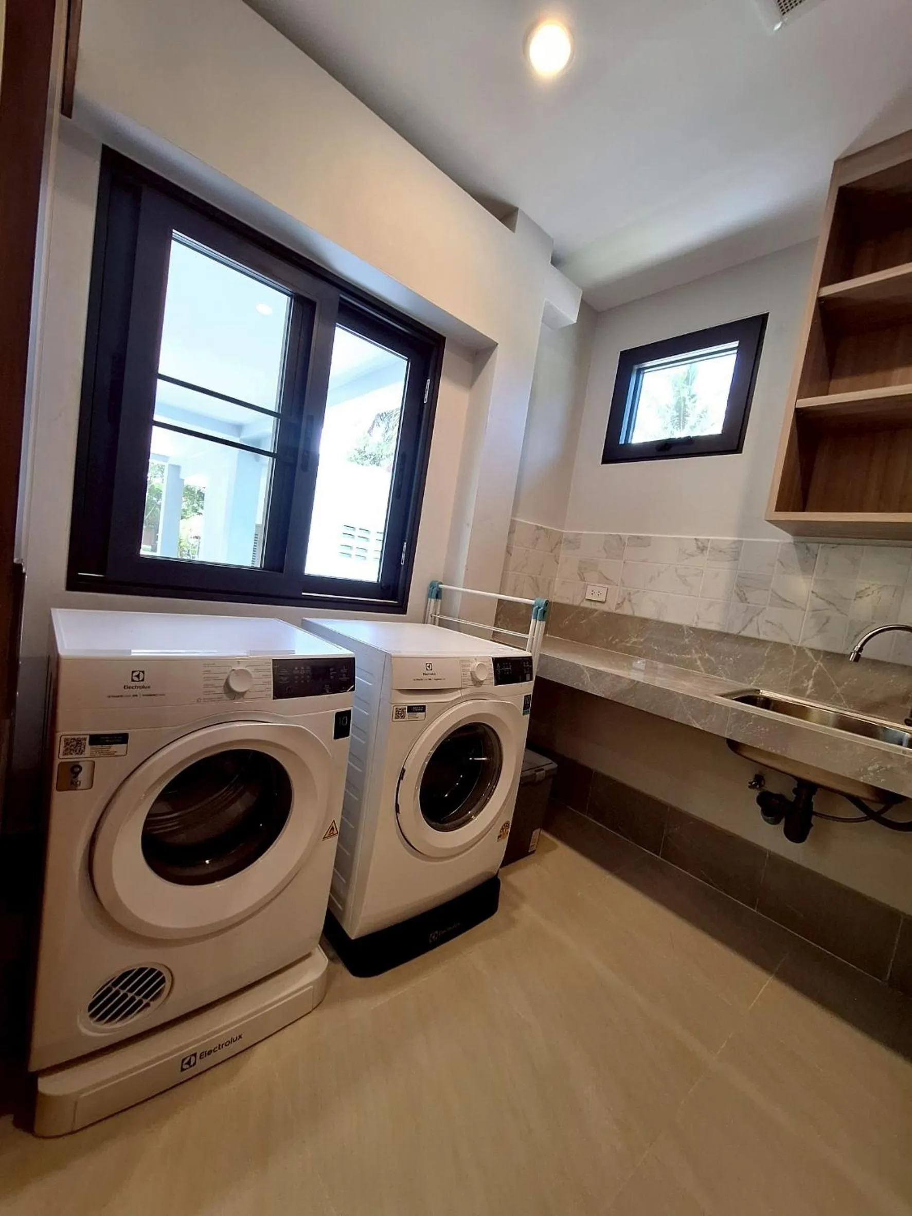 washing machine in ThaiLife Wellness & Meditation Resort- SHA Plus