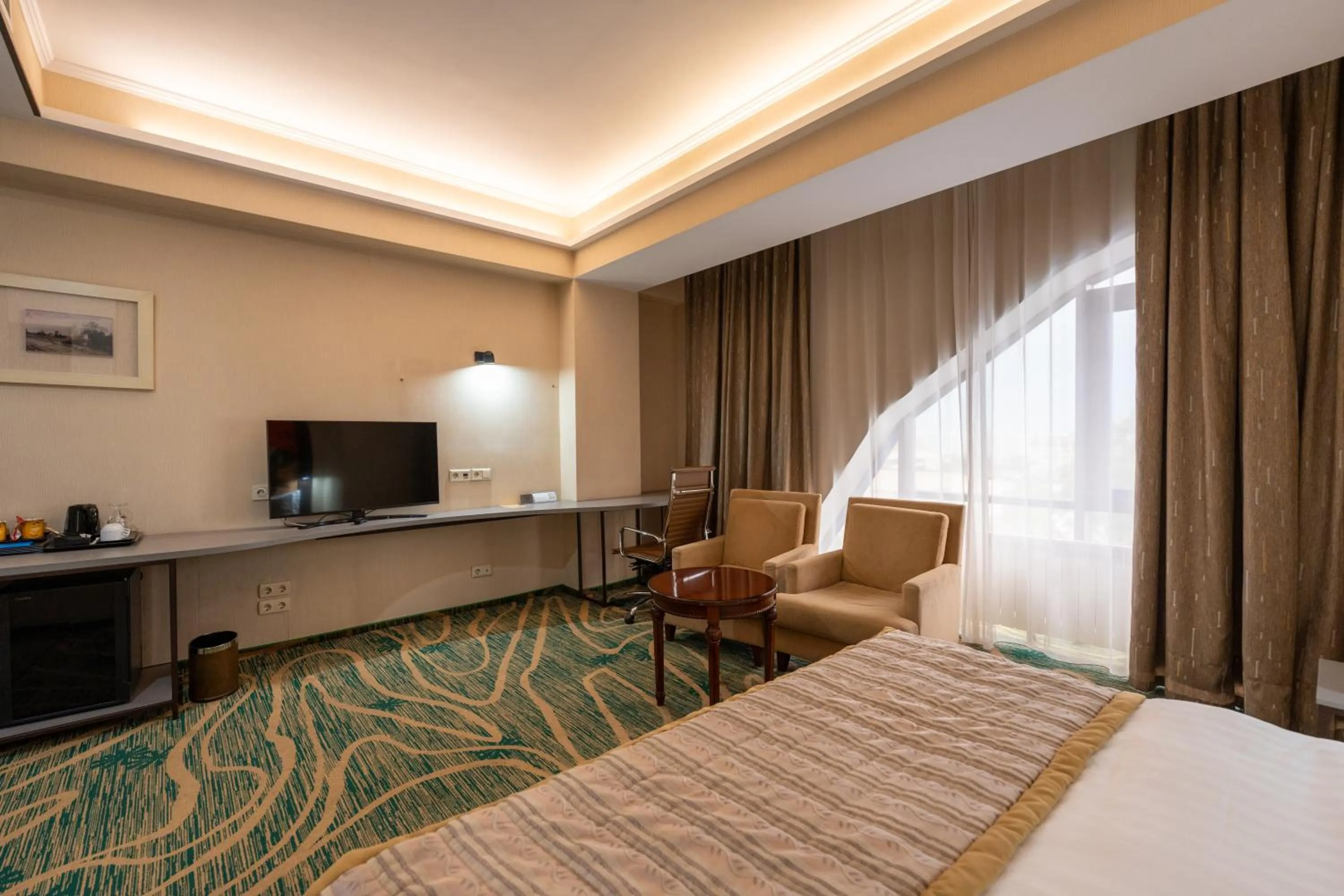 Bed in Hotel Kazzhol Almaty