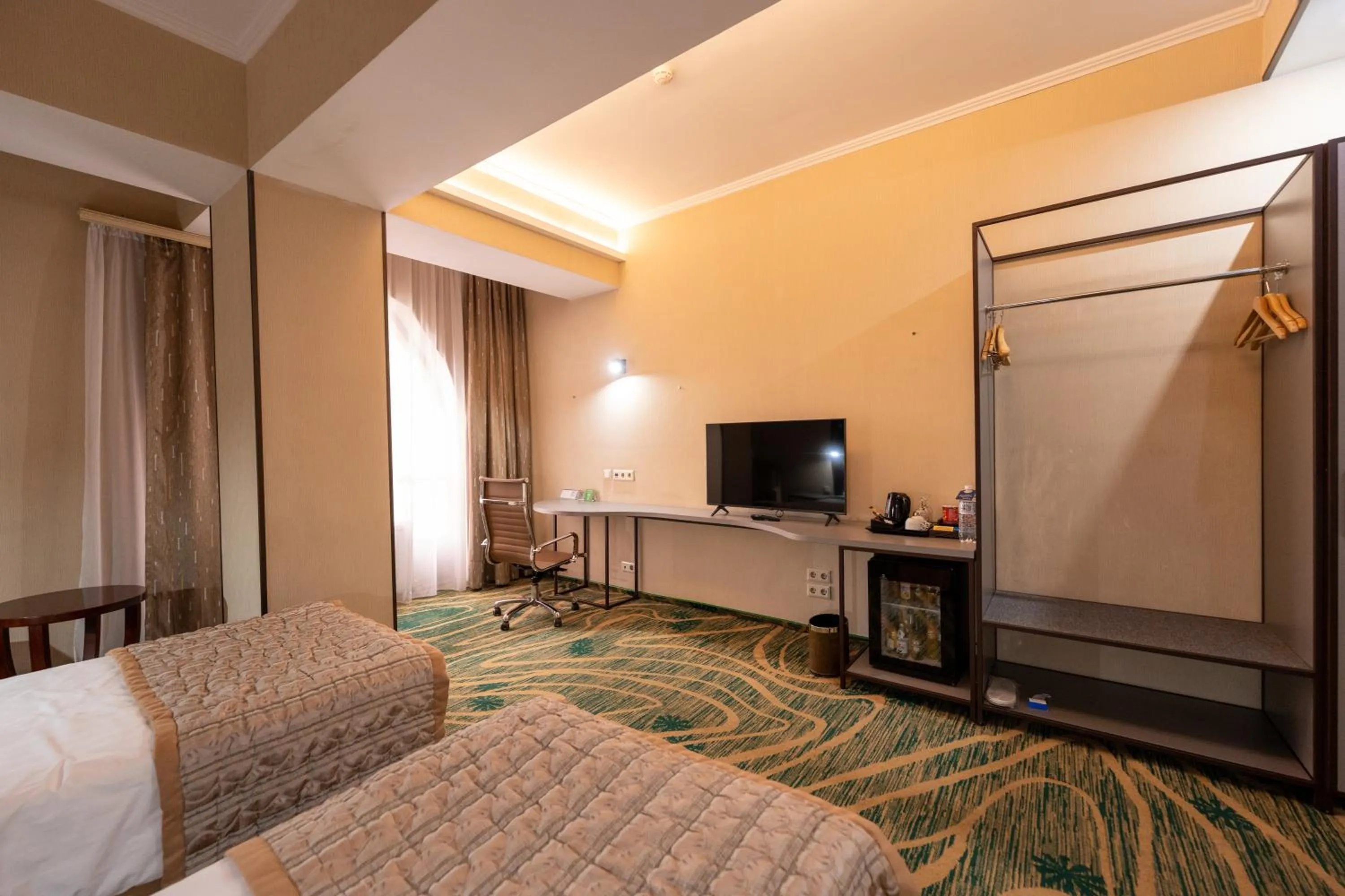 Bed in Hotel Kazzhol Almaty