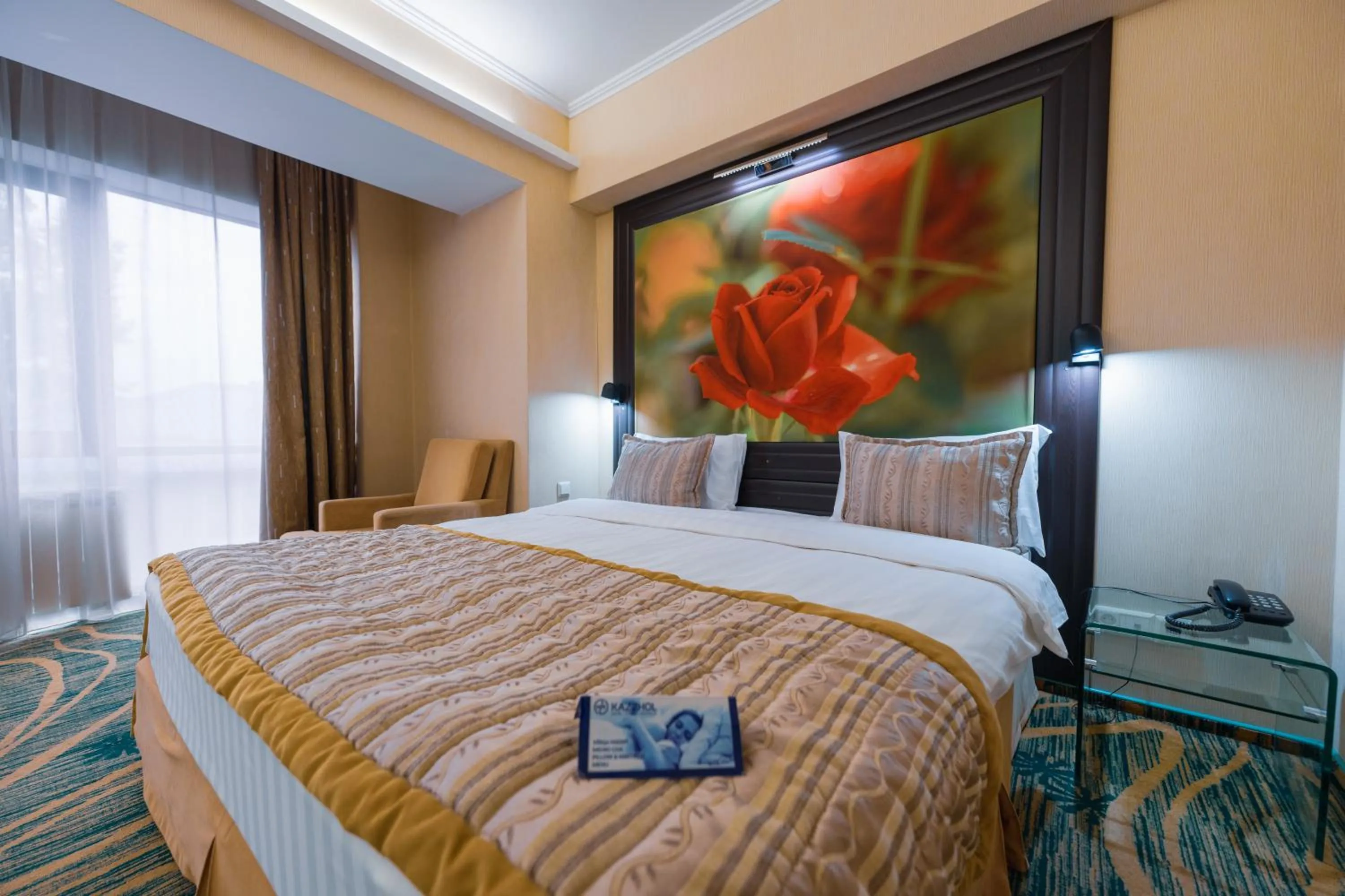 Bed in Hotel Kazzhol Almaty