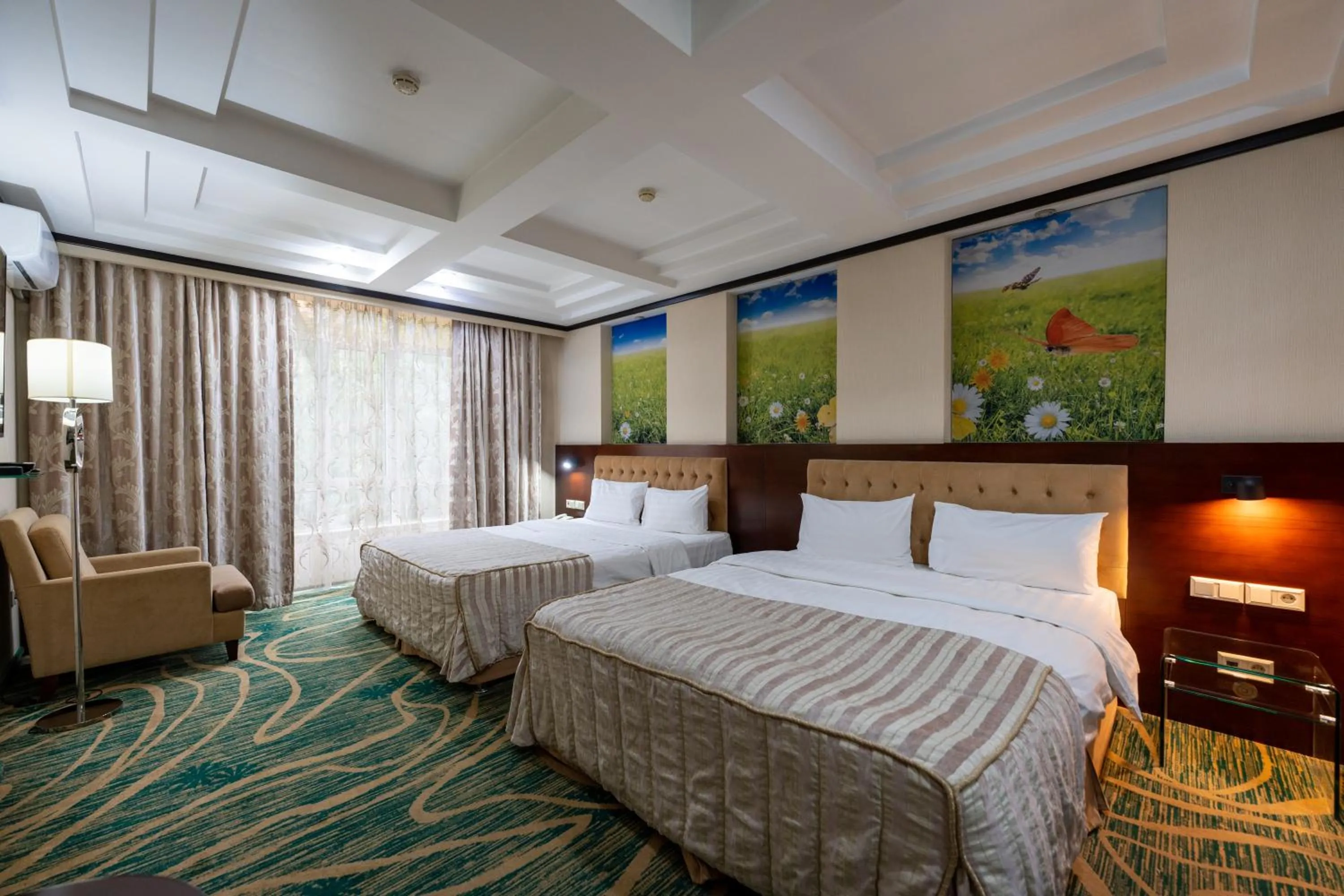 Bed in Hotel Kazzhol Almaty