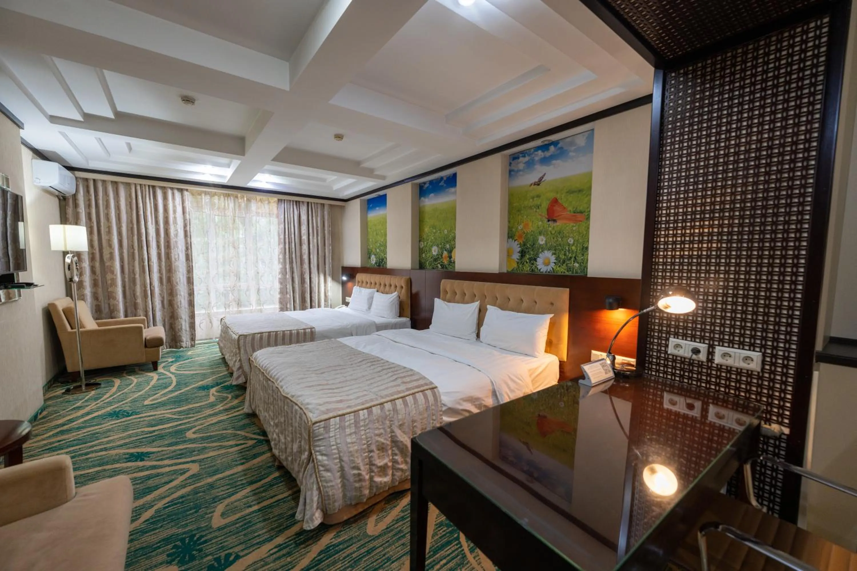 Bed in Hotel Kazzhol Almaty