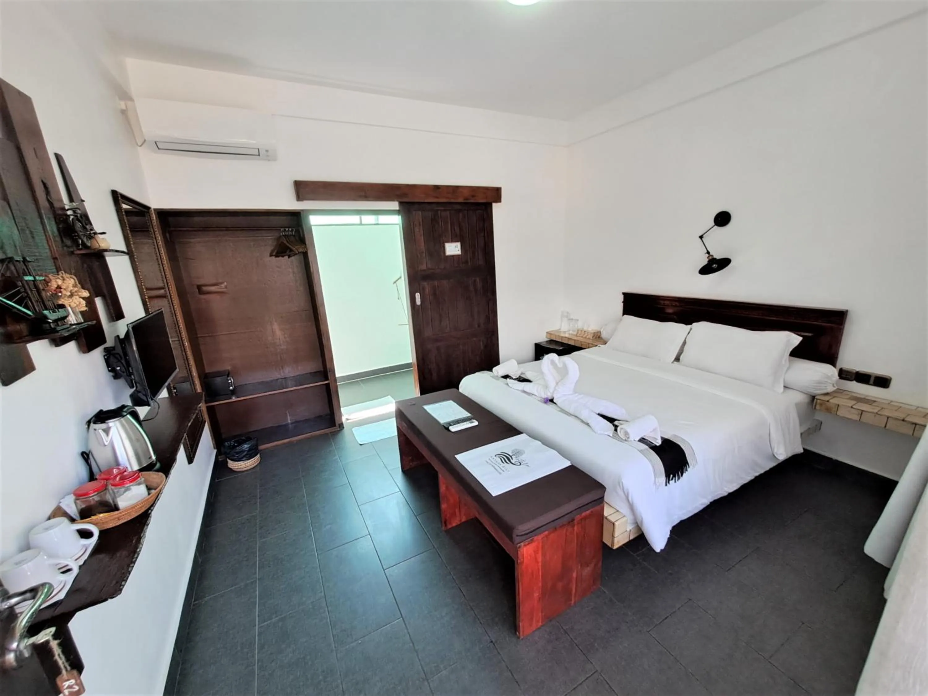 Photo of the whole room, Bed in Katara Gili, Boutique Rooms and Bungalows