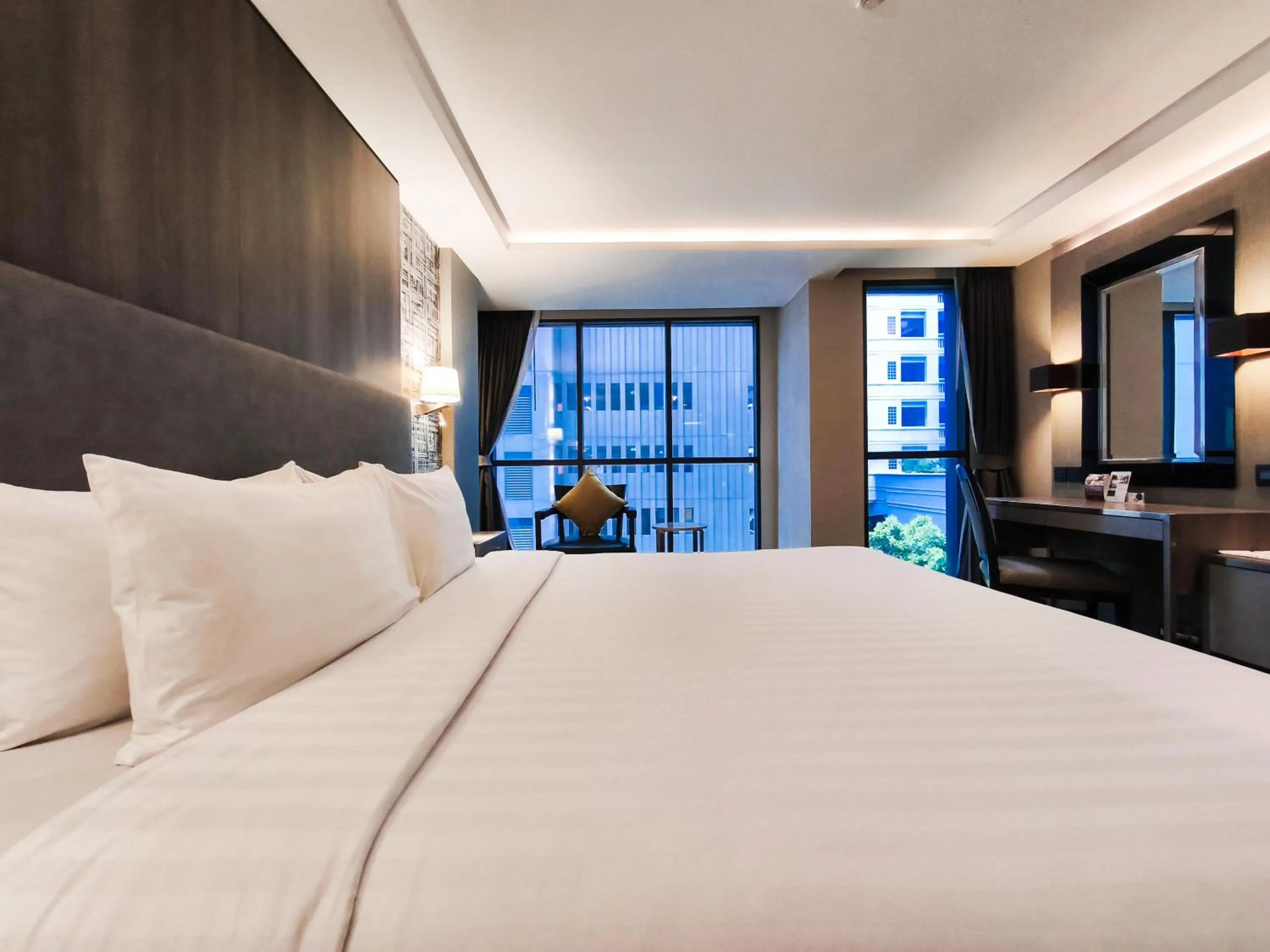 Bed in Citrus Suites Sukhumvit 6 by Compass Hospitality