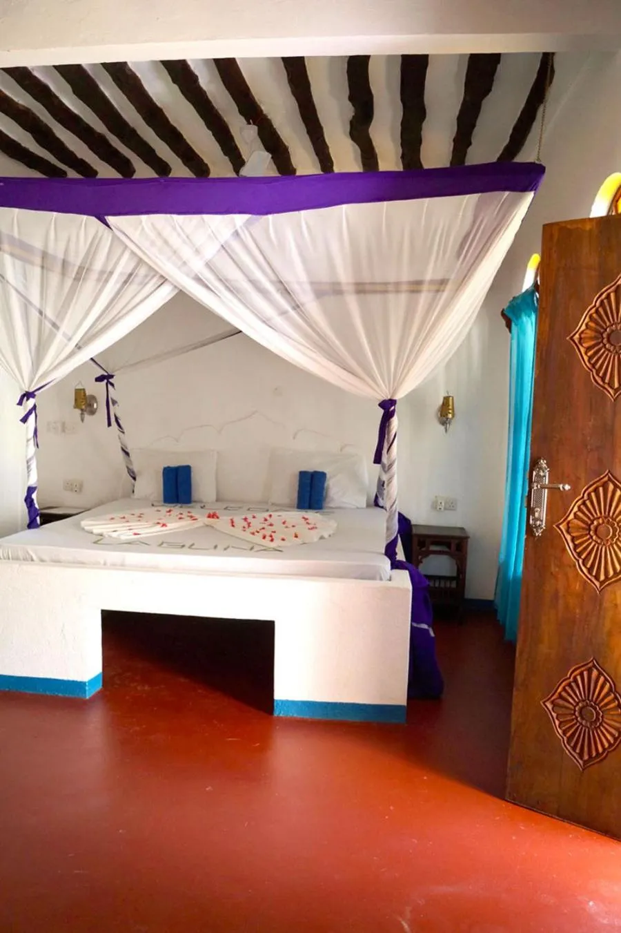 Bed in Laguna Palace Zanzibar