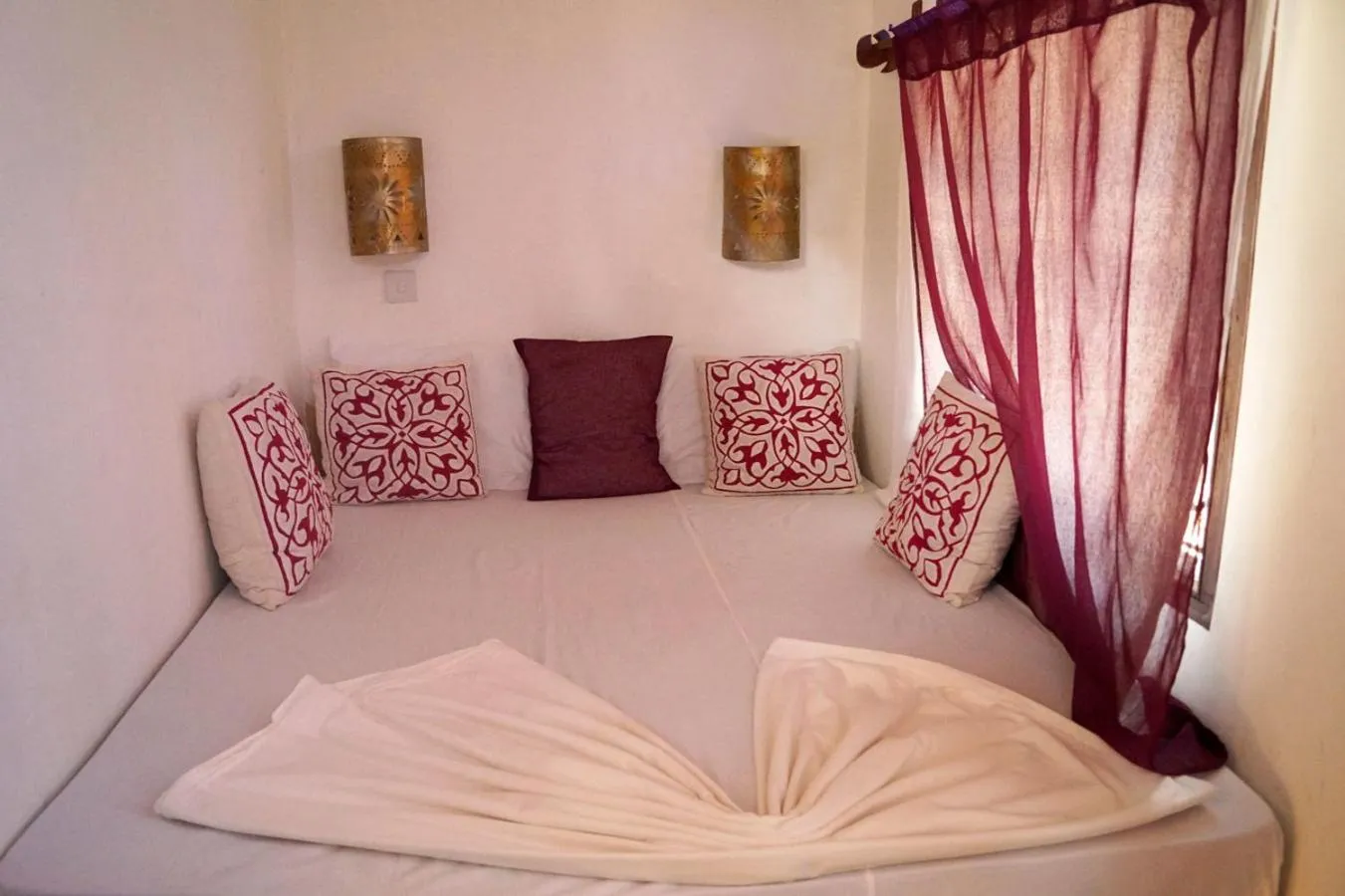 Bed in Laguna Palace Zanzibar