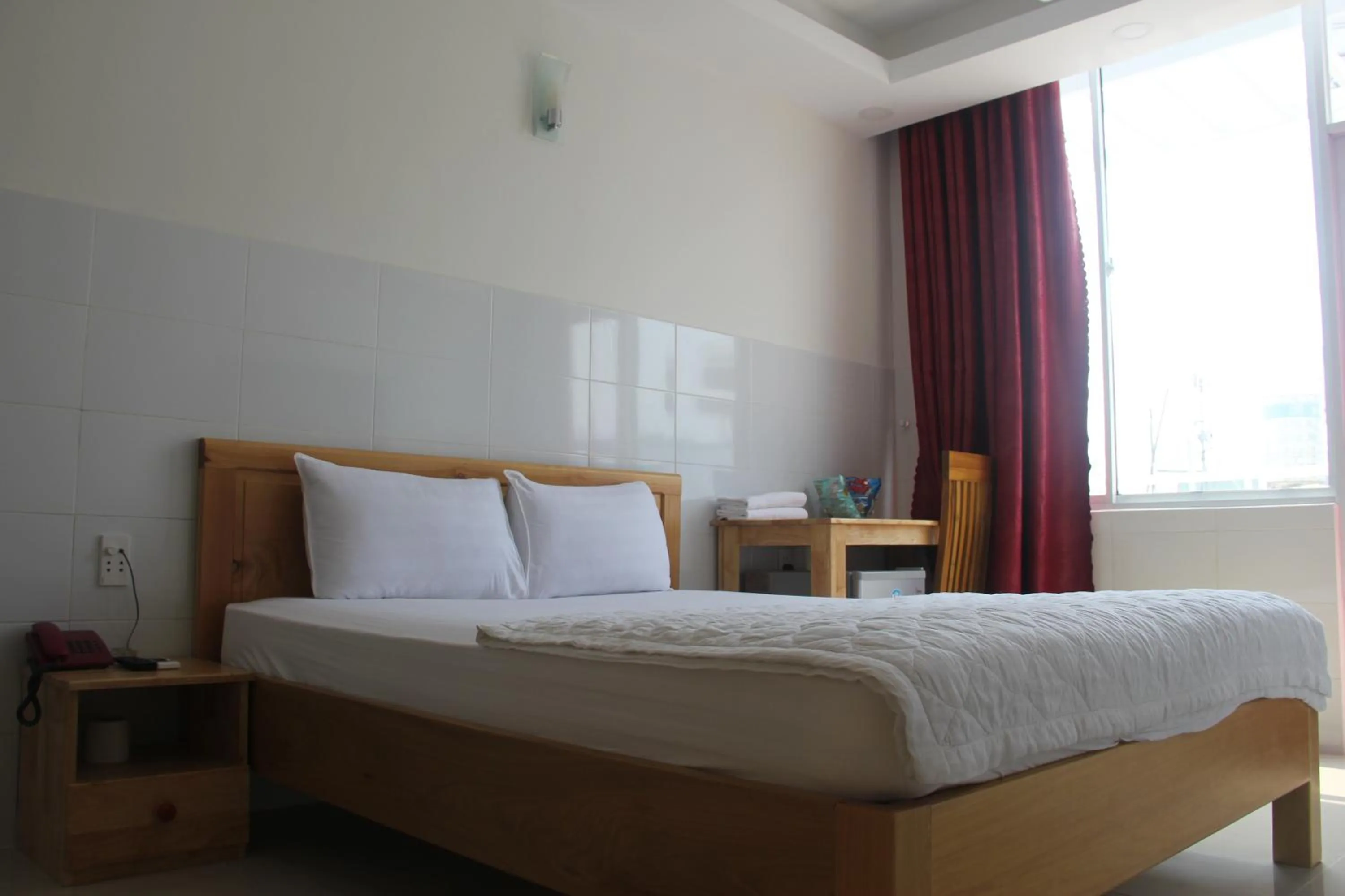 Bed in Sai Gon River Hotel