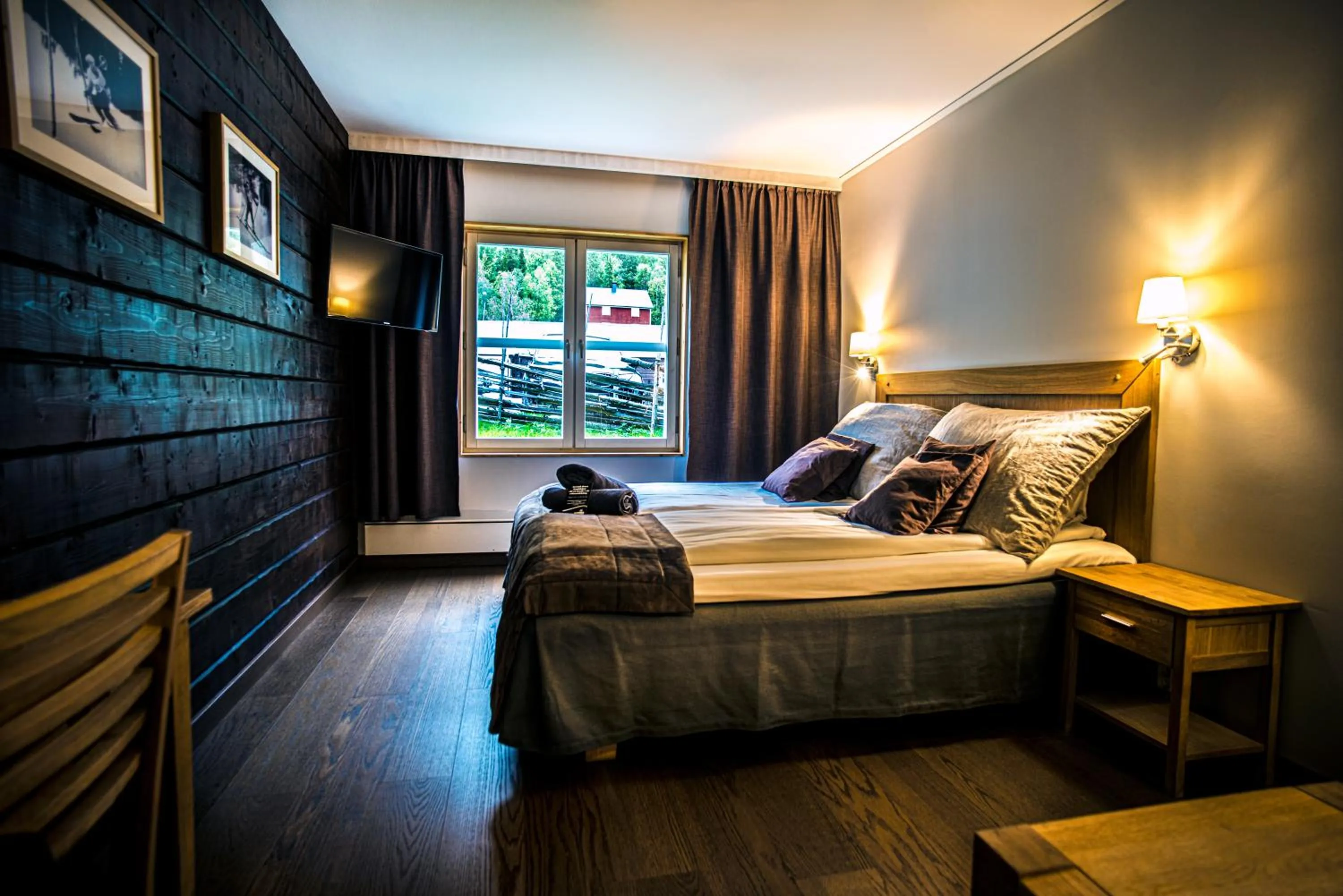 Photo of the whole room, Bed in Eriksgårdens Fjällhotell