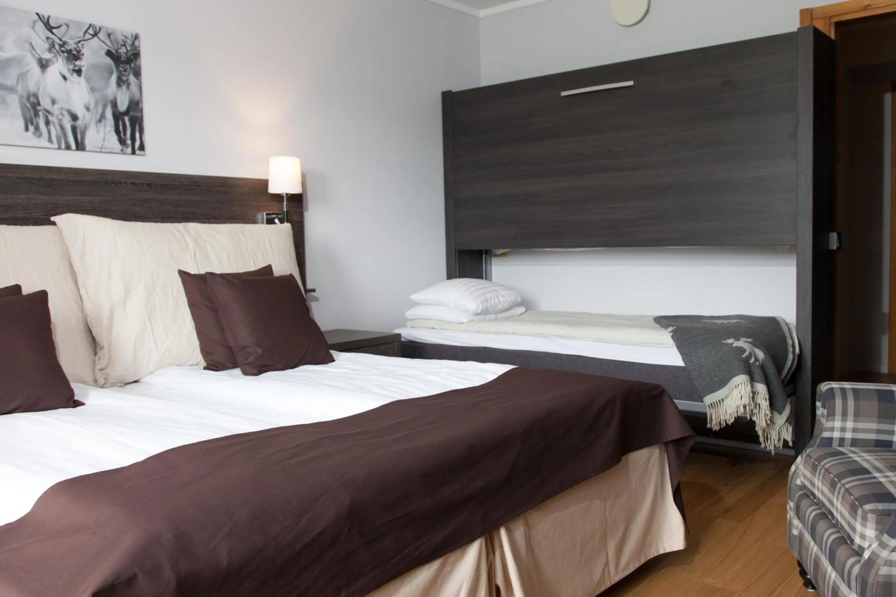 Photo of the whole room, Bed in Eriksgårdens Fjällhotell