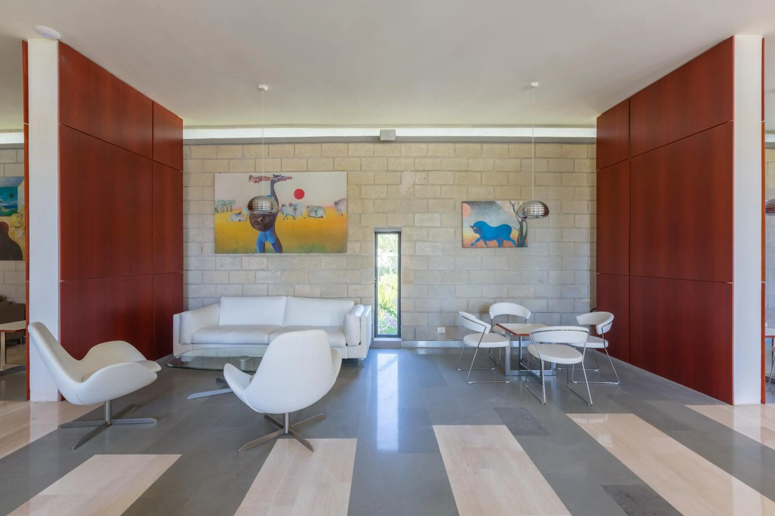 Communal lounge/ TV room in Valtur Baia del Gusmay Beach Resort