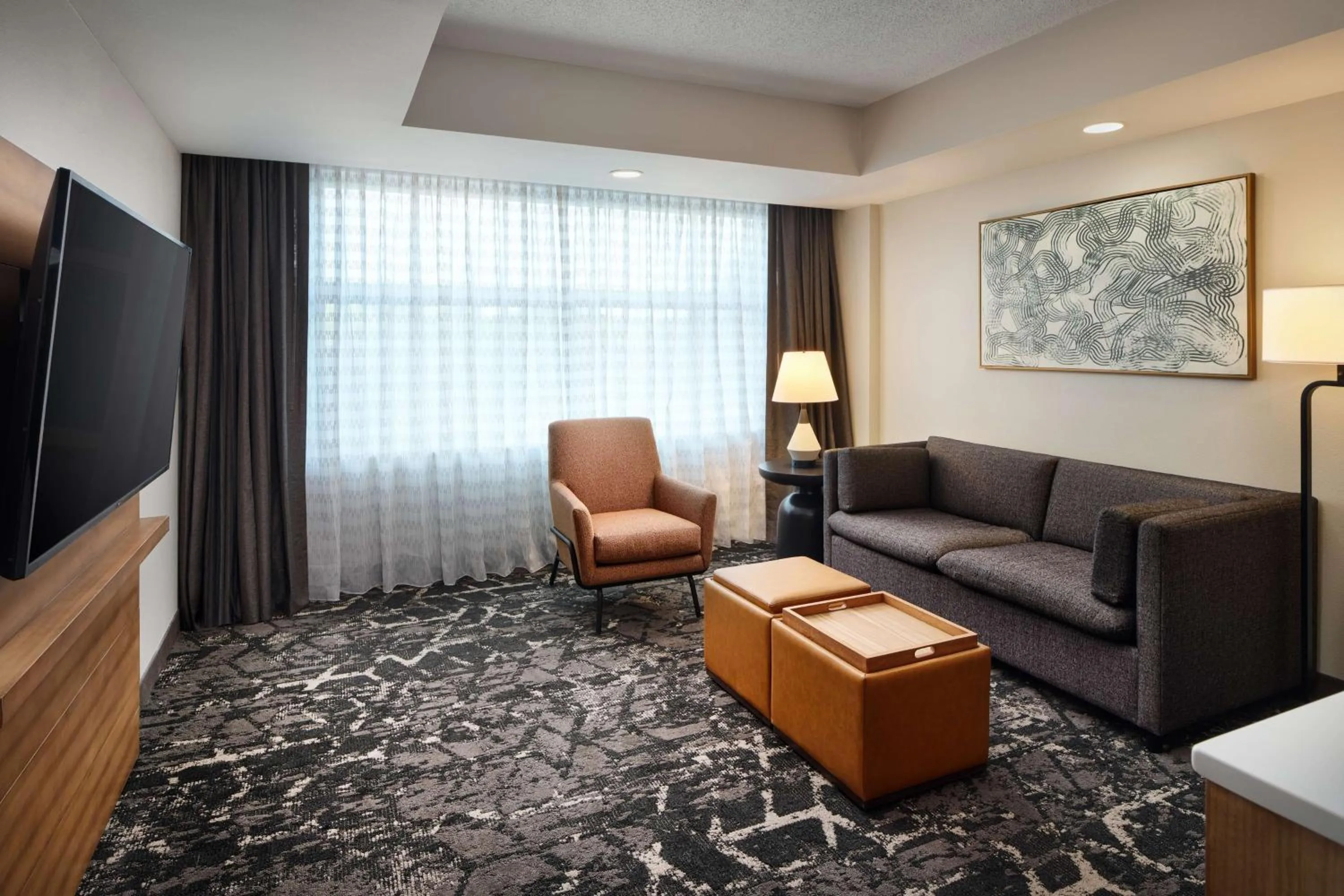 Living room in Embassy Suites by Hilton Hampton Convention Center