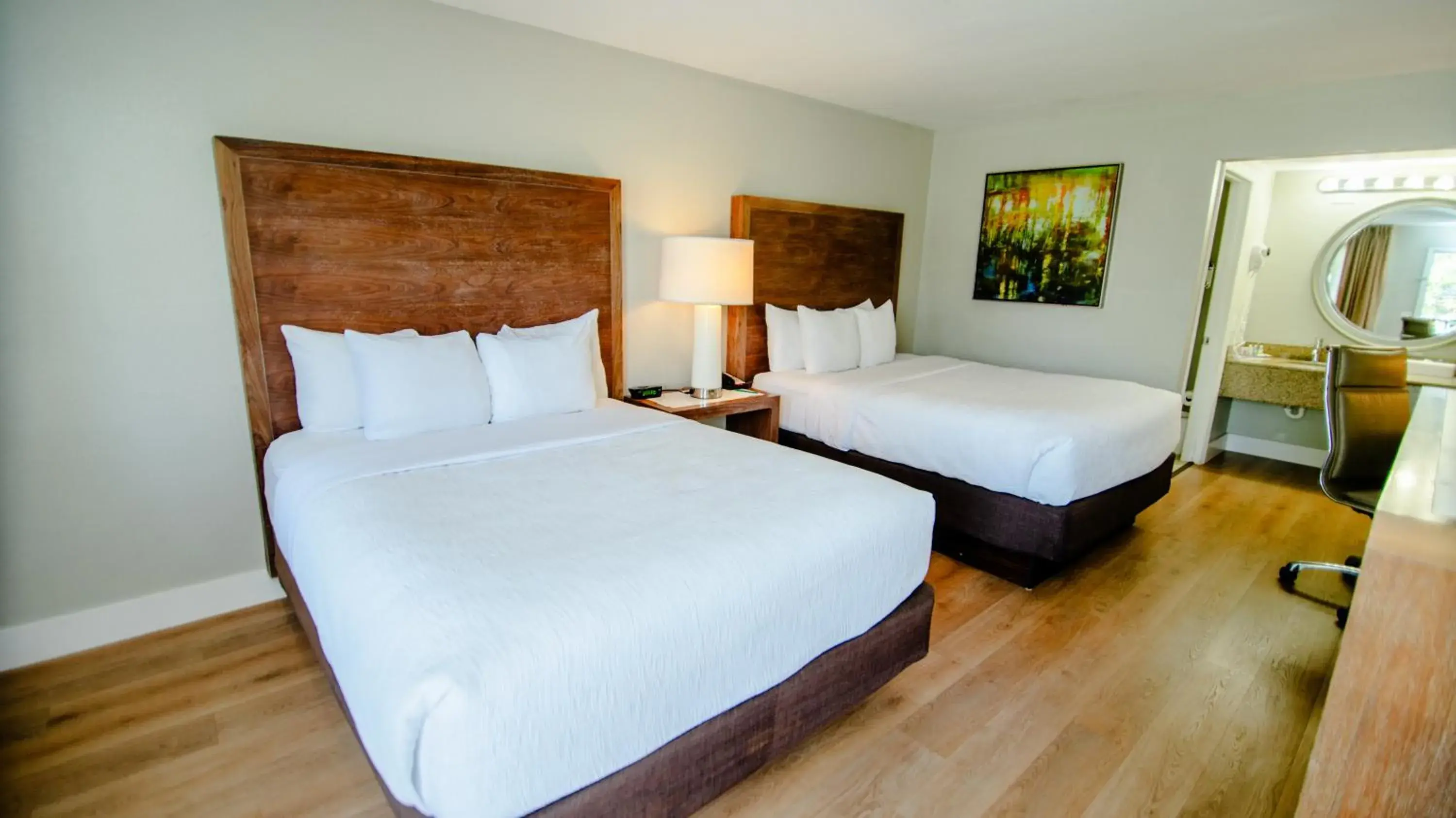 Bed in Quality Inn & Suites By the Parks Bed in Quality Inn & Suites By the Parks