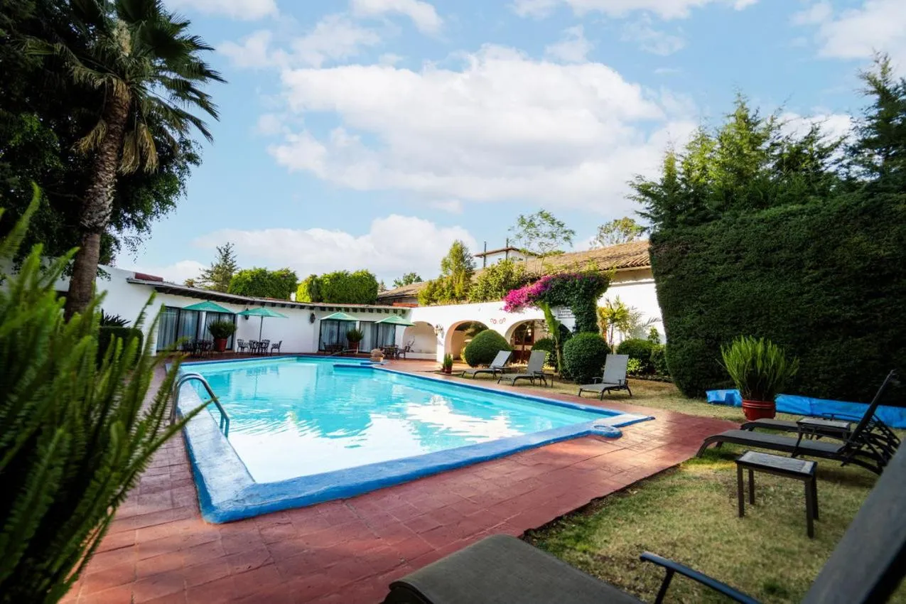 Swimming pool in Best Western Plus Posada de Don Vasco