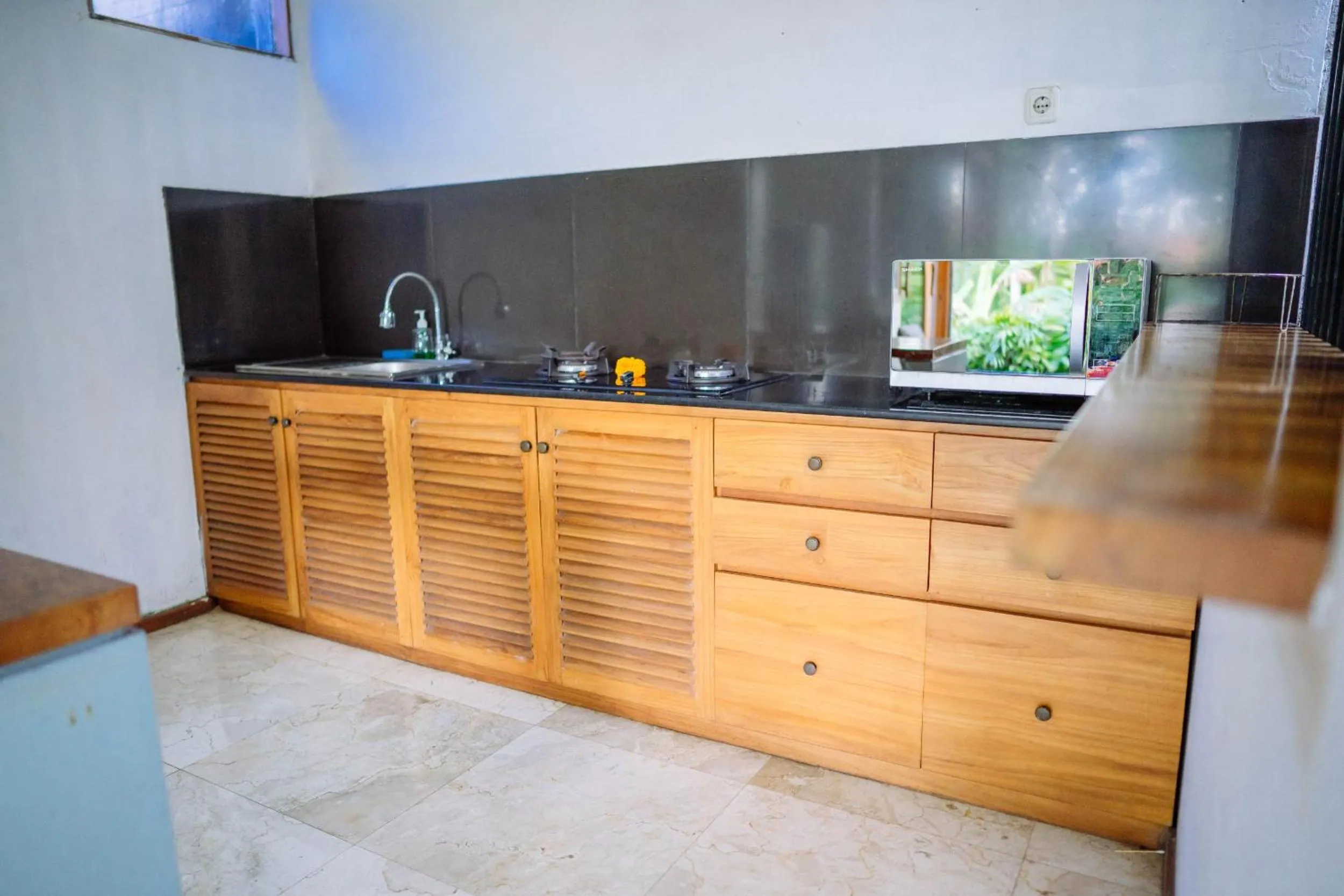 Kitchen or kitchenette in Ume Sri Villas Ubud
