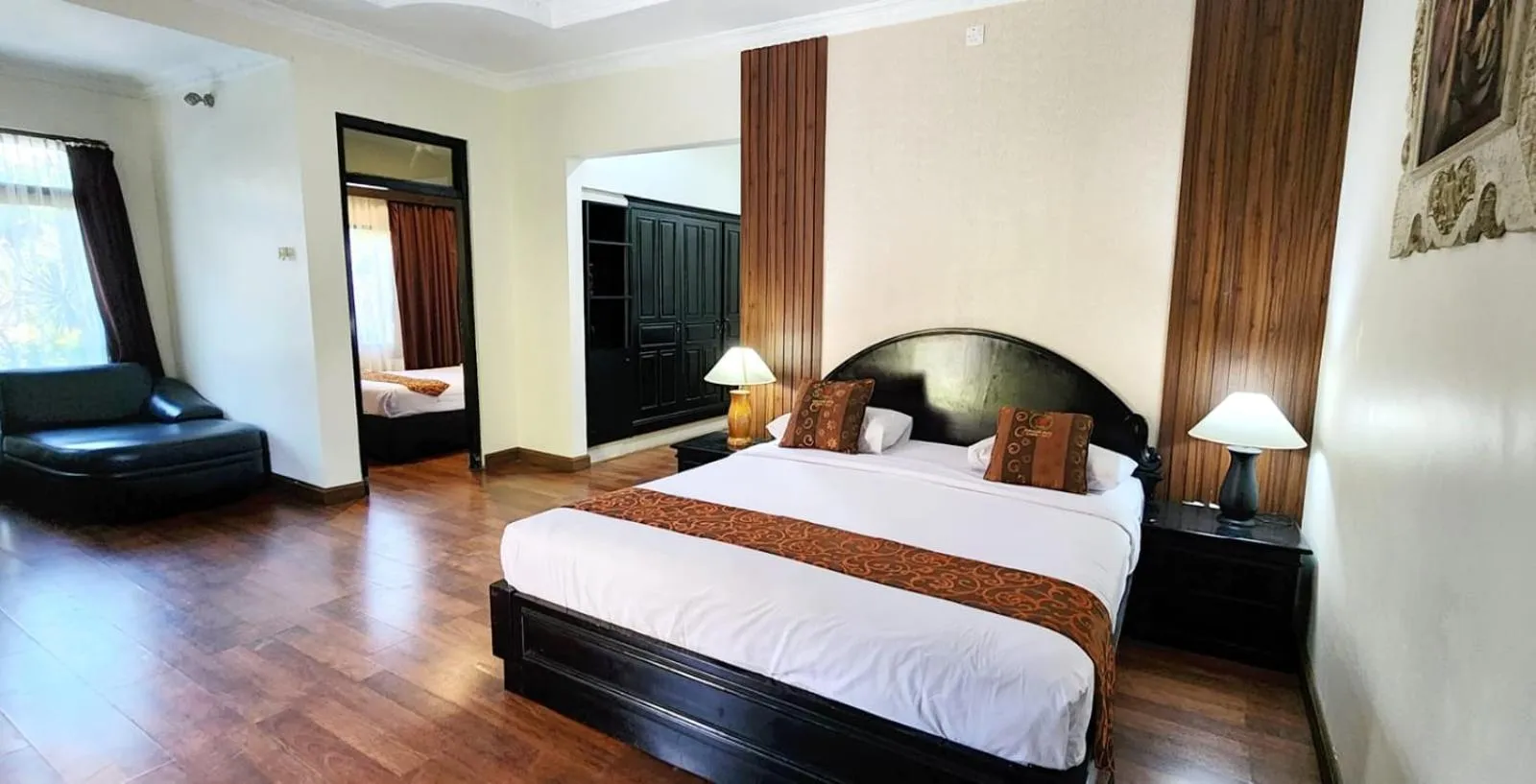 Bed in Stana Puri Gopa Hotel