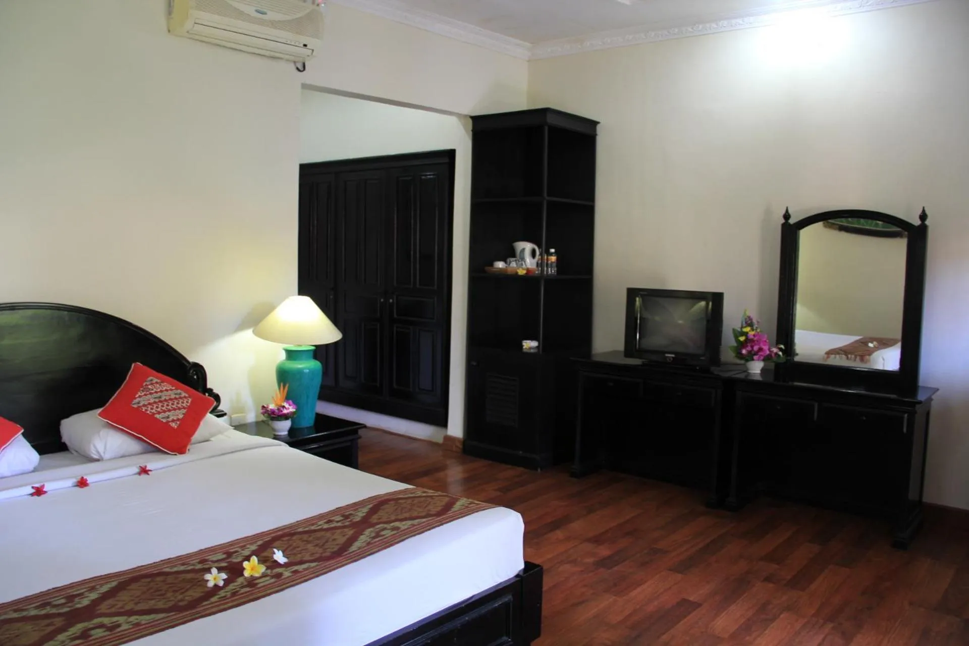 Bed in Stana Puri Gopa Hotel