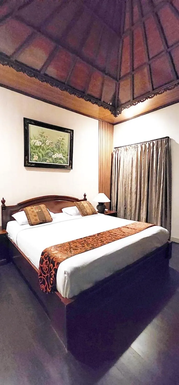 Bed in Stana Puri Gopa Hotel