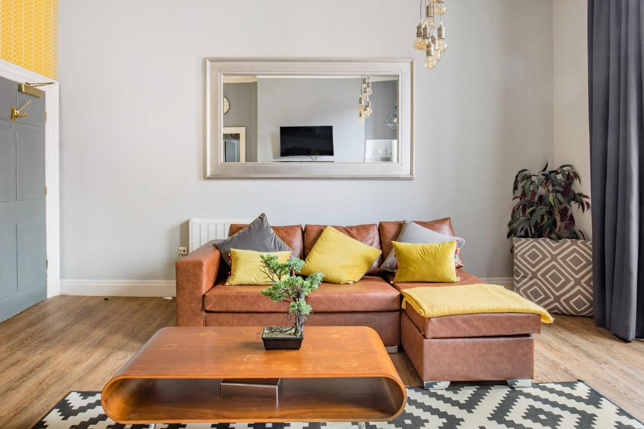 Living room in The Corson at Claremont Apartments