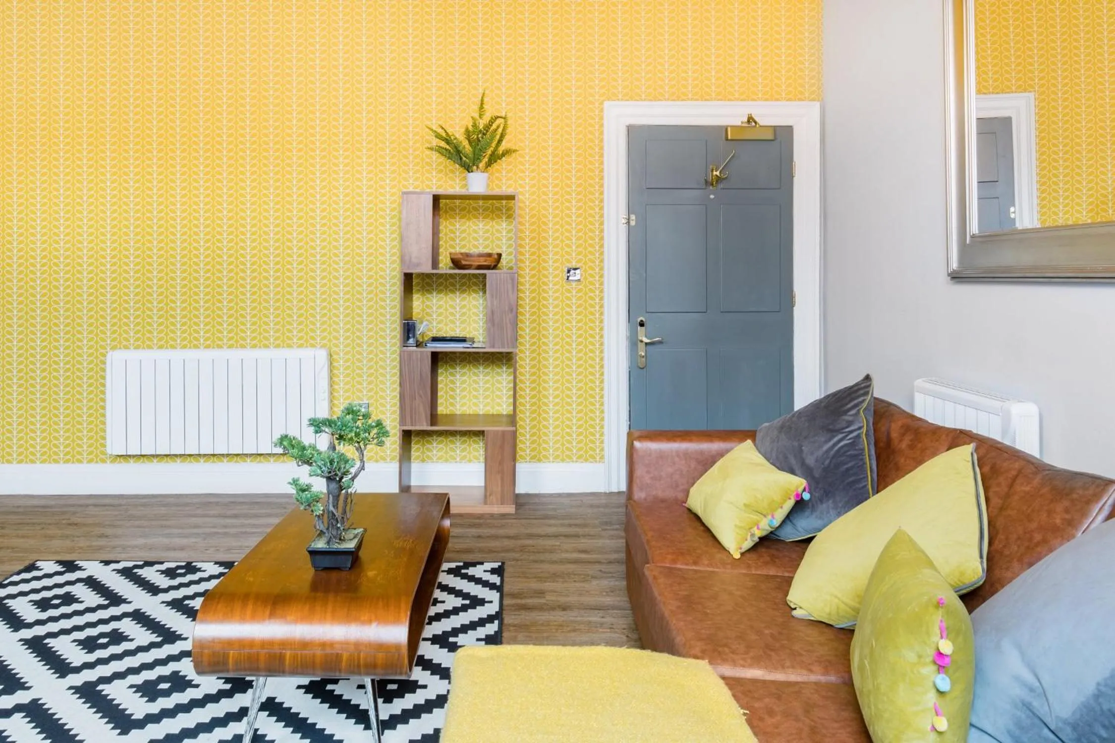Living room in The Corson at Claremont Apartments