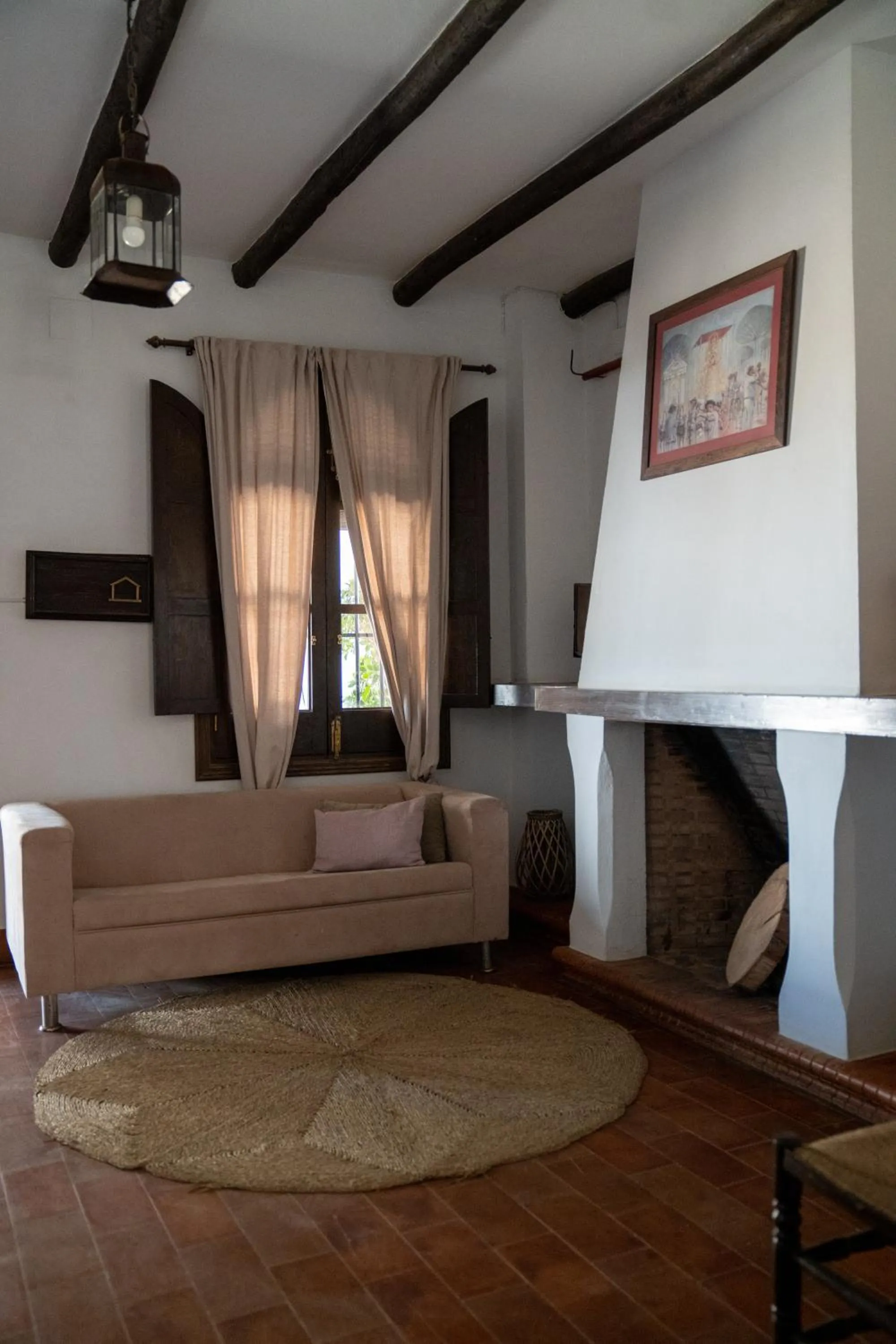 Communal lounge/ TV room in Hospedarte Arenas de El Rocio