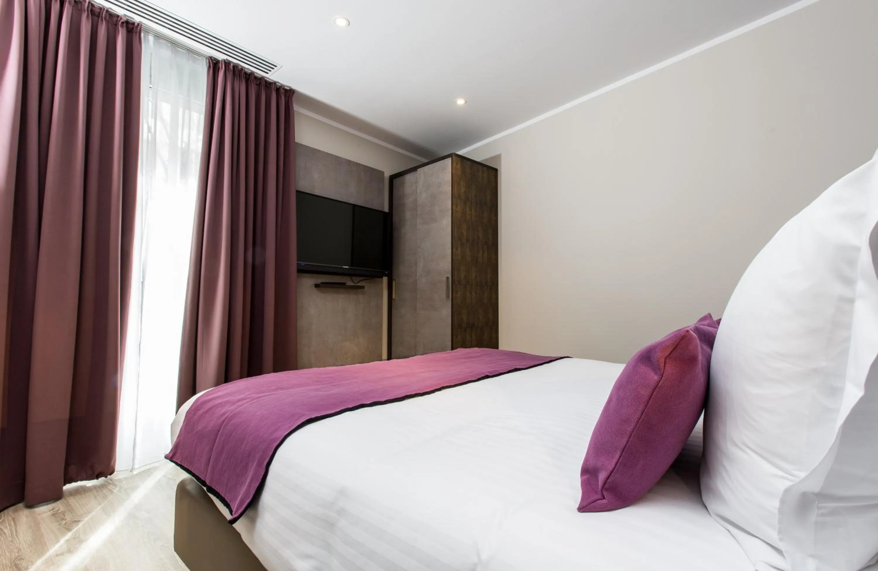 Photo of the whole room, Bed in Leonardo Boutique Hotel Barcelona Sagrada Familia