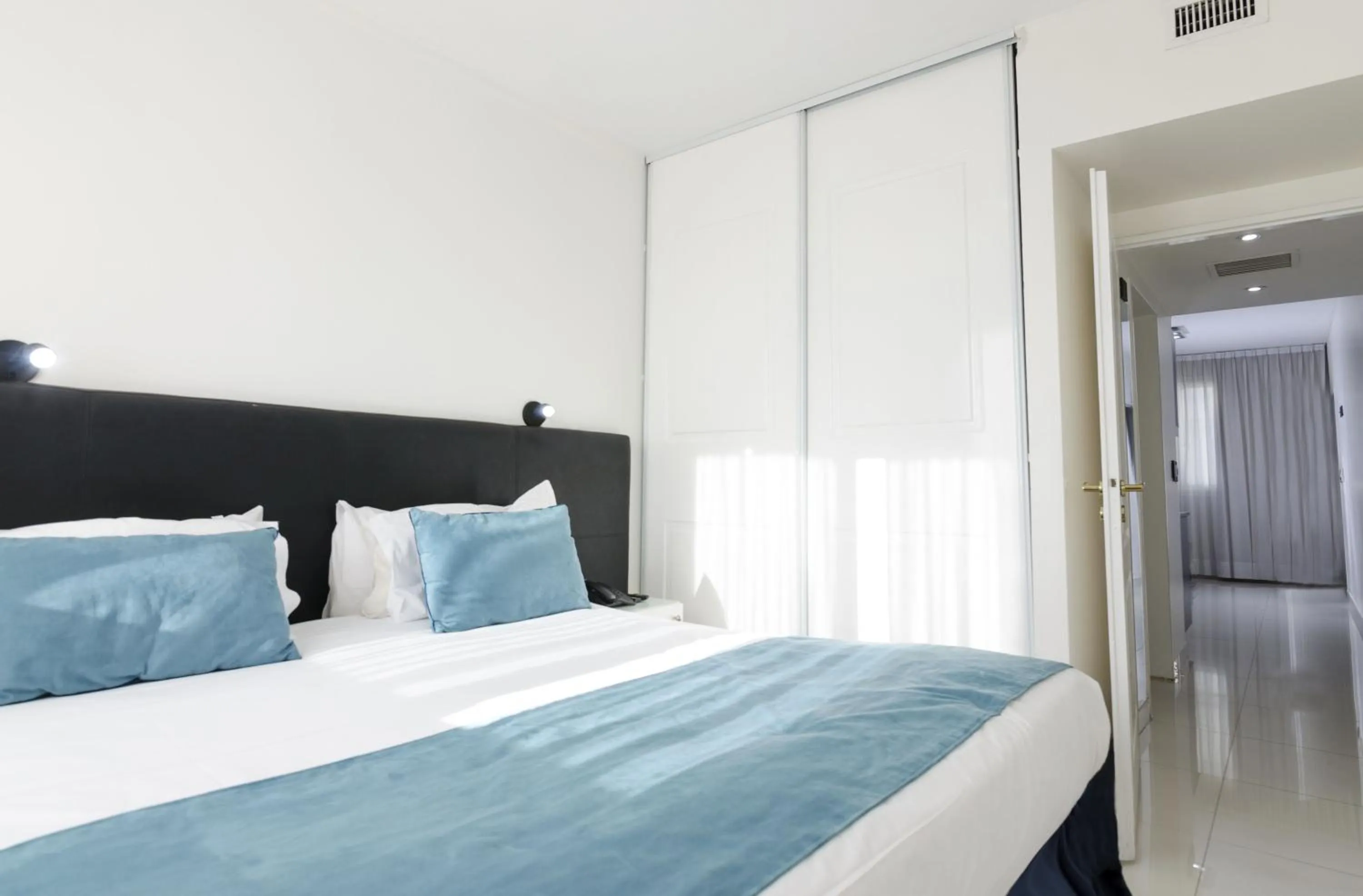 Bed in Cyan Recoleta Hotel