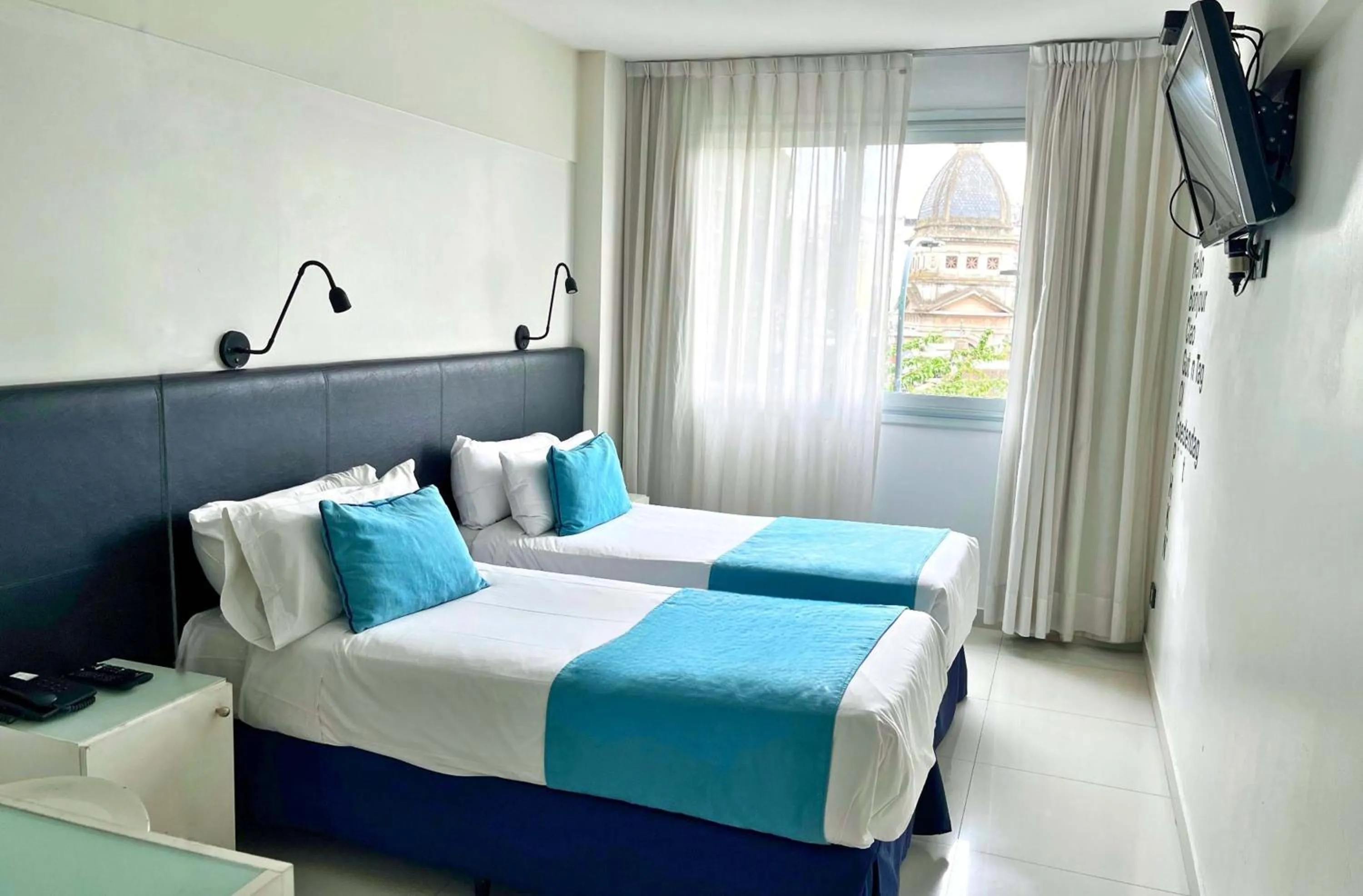 Bed in Cyan Recoleta Hotel