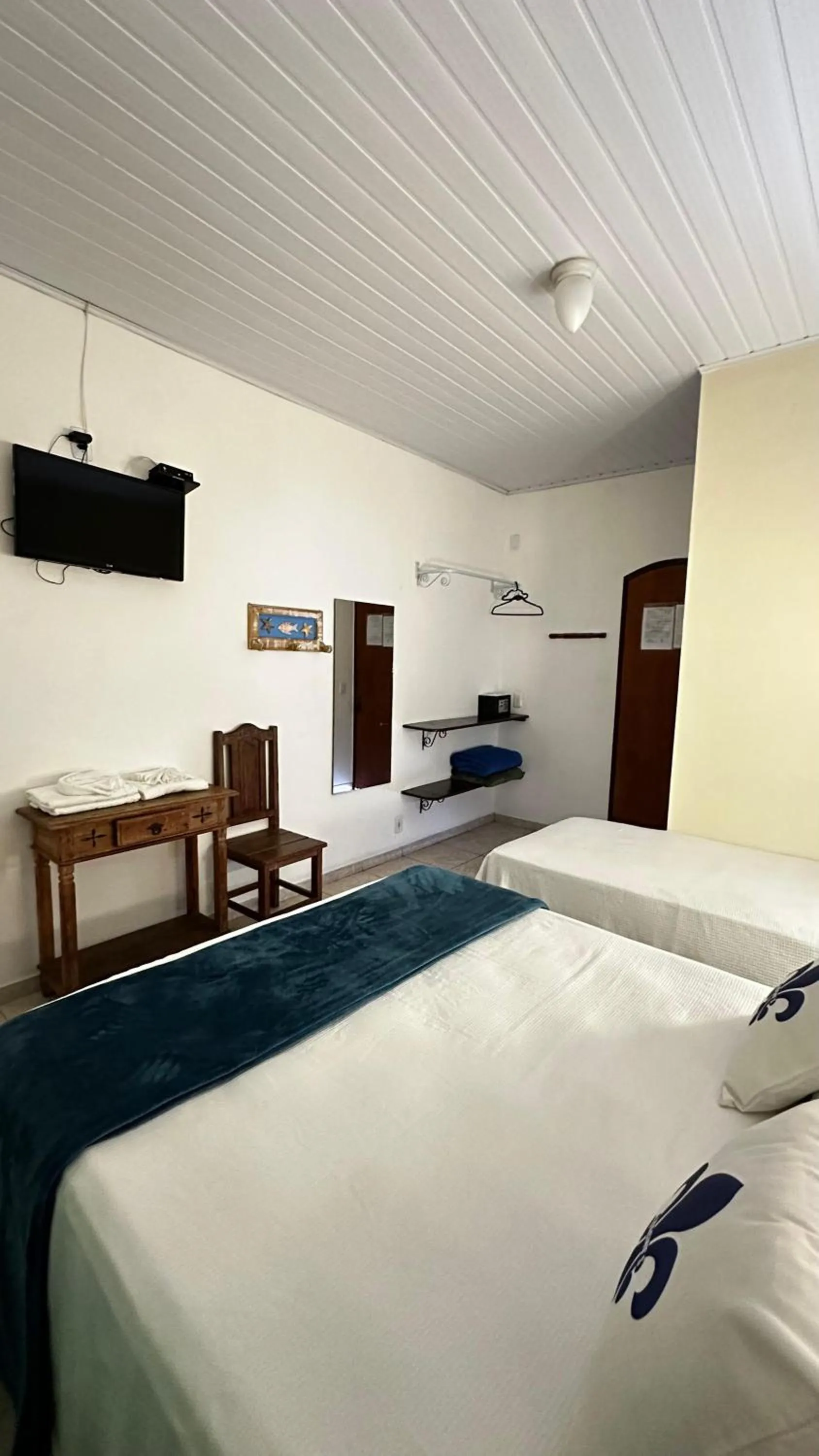 Bed in Magnu´s Pousada