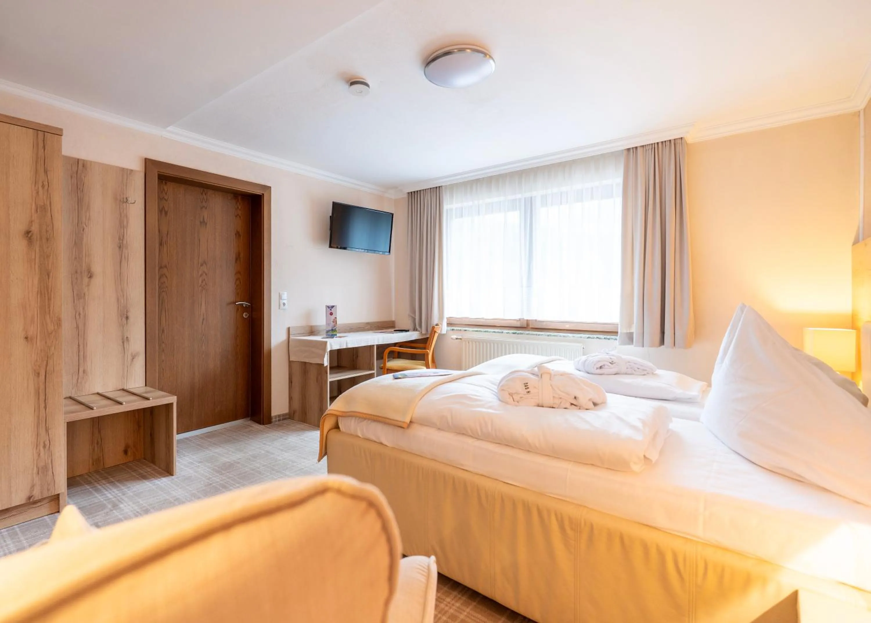 Bed in Chalet Ferienhaus Hubertus