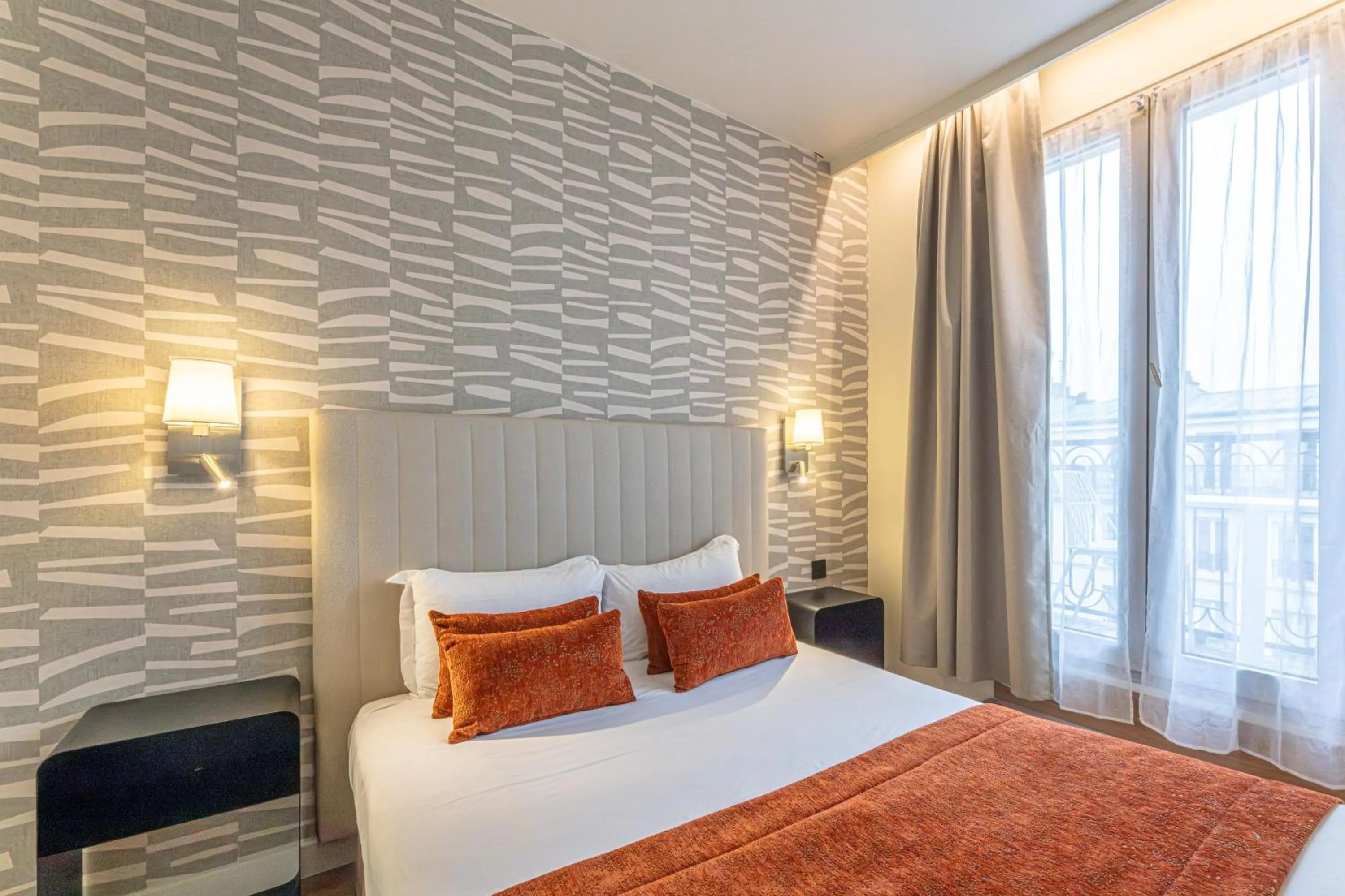 Bed in Hôtel De Venise