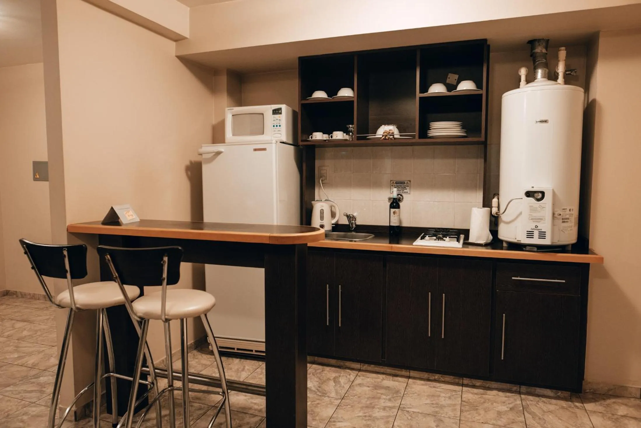 Kitchen or kitchenette in Vecchia Terra Apart Hotel