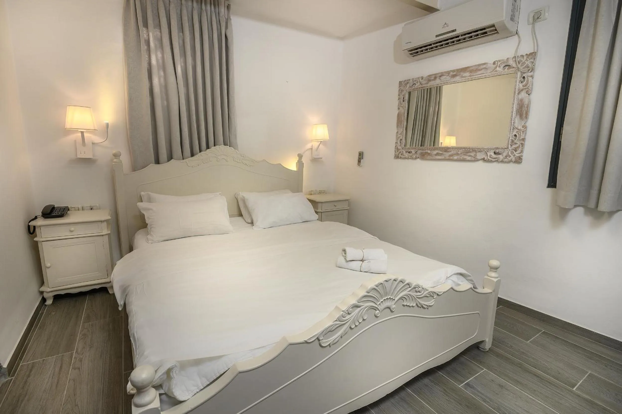 Bed in Shirat Hayam Boutique Hotel