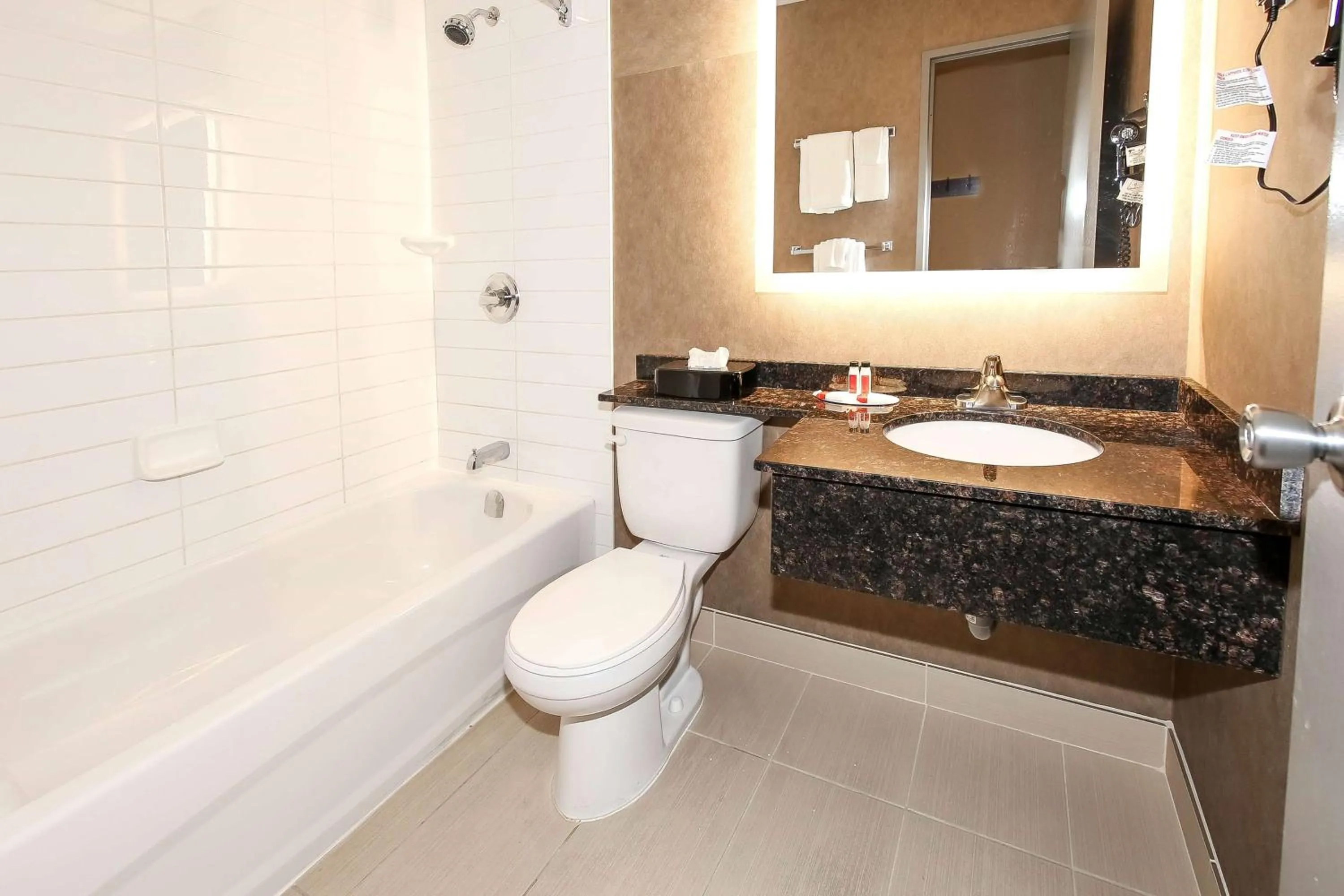 Bathroom in Howard Johnson by Wyndham Winnipeg West
