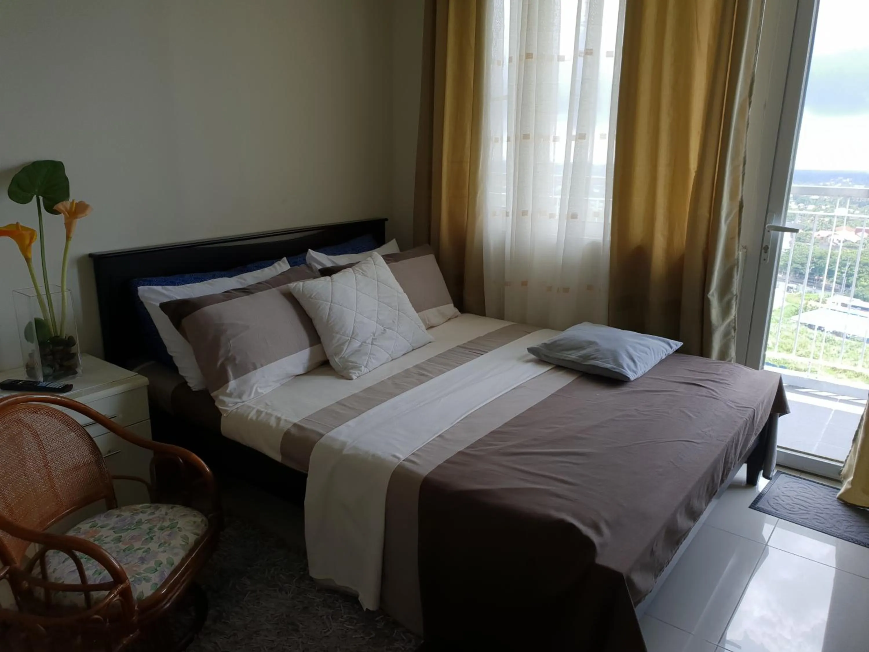 Bed in Wind Residences by Bea and RM