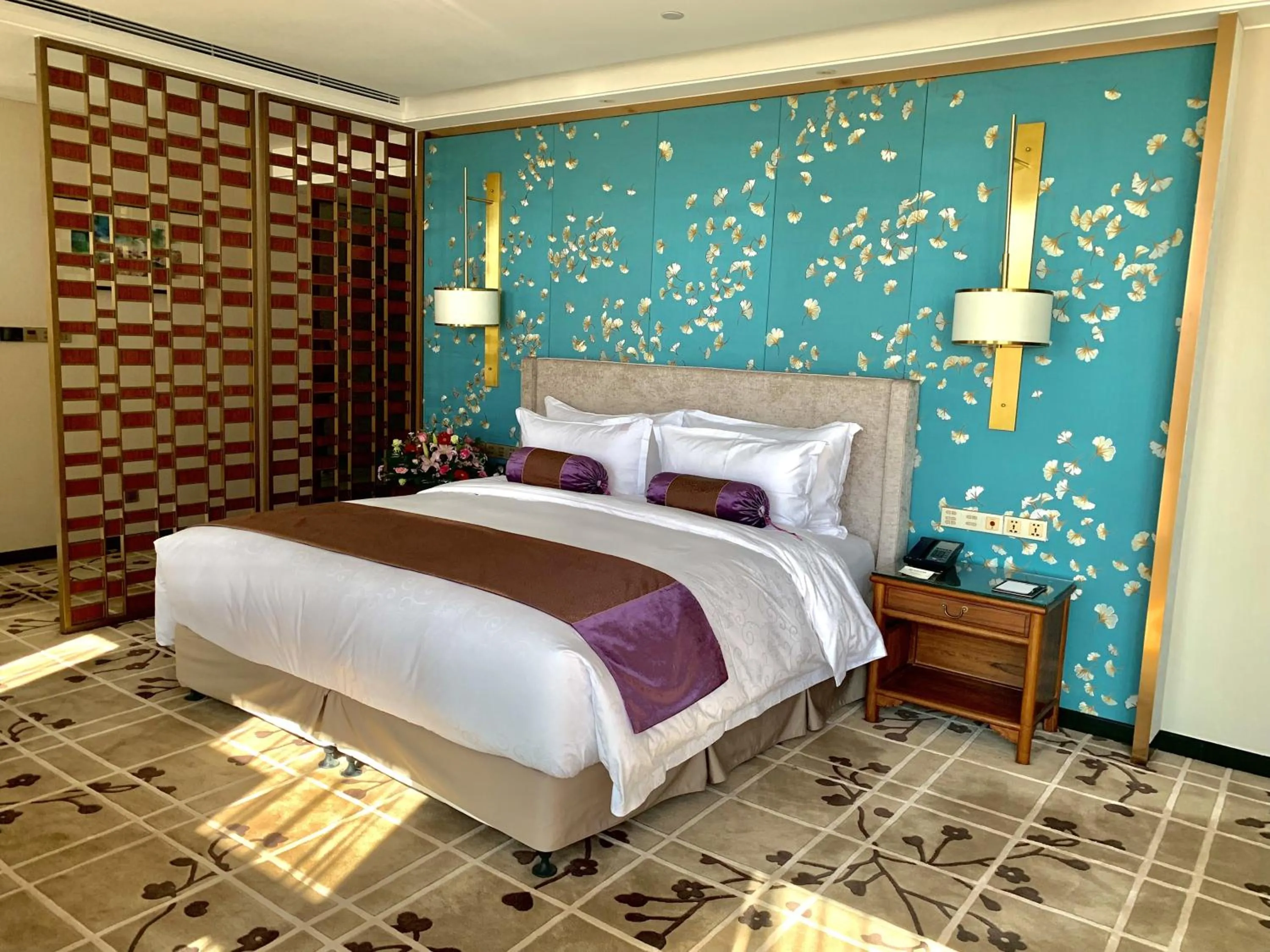 Bed in Ordos Yonggui Hotel