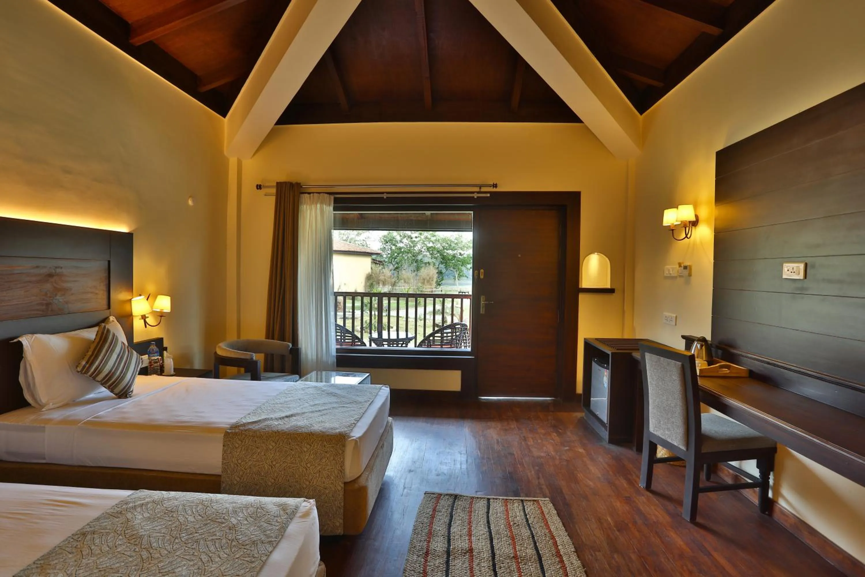 Bedroom, Bed in Jungle Villa Resort - Near Chitwan National Park