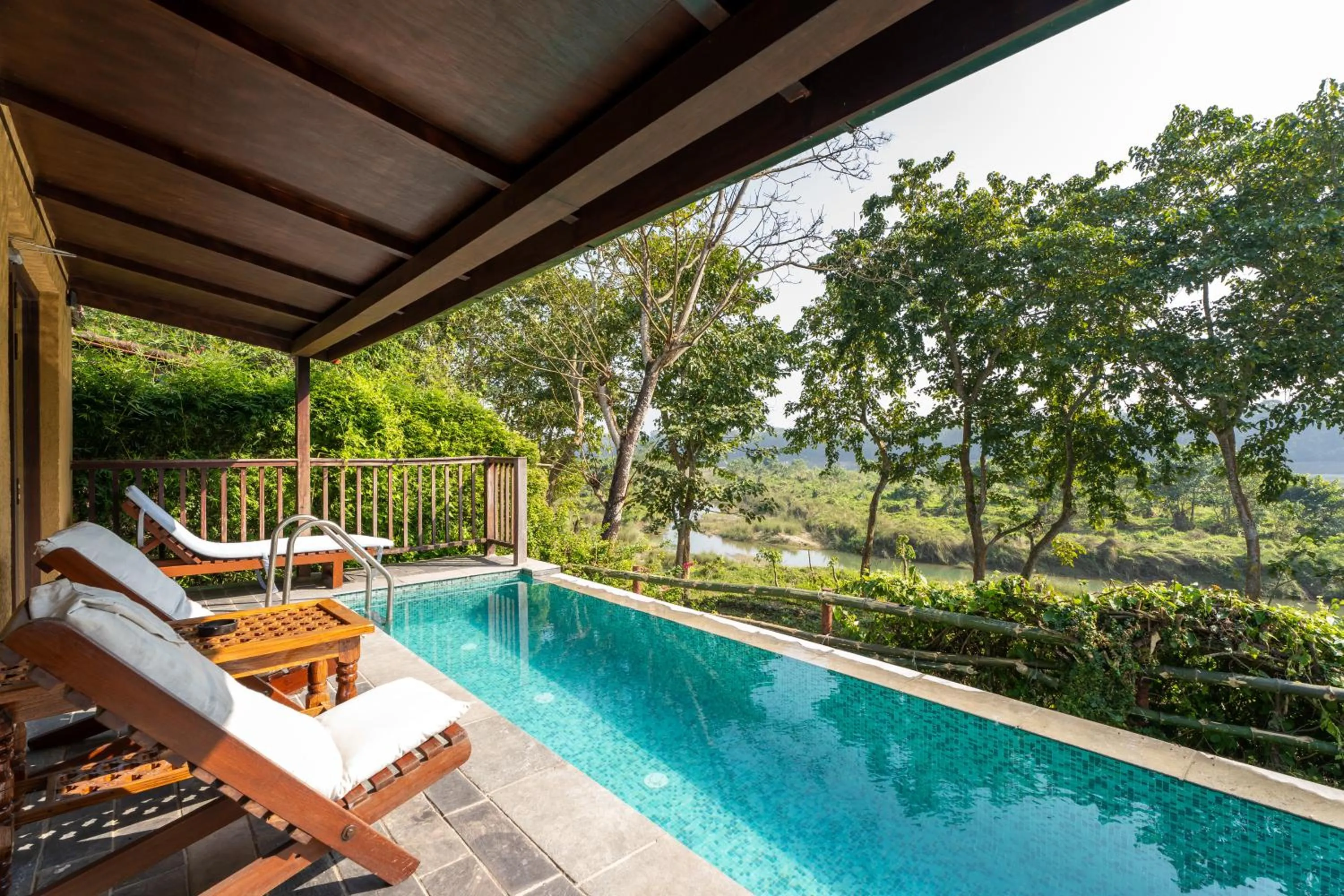 Swimming pool in Jungle Villa Resort - Near Chitwan National Park