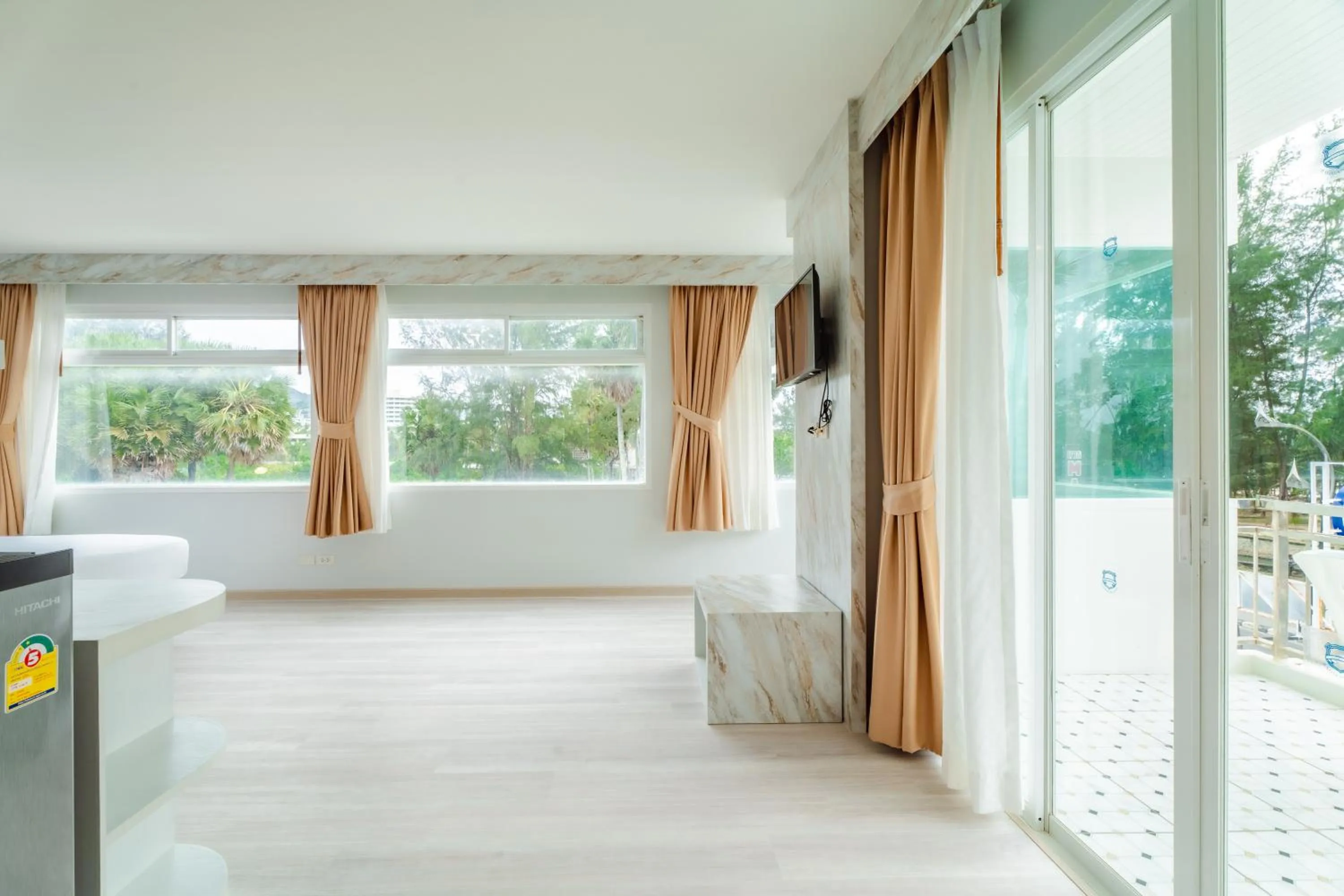 Photo of the whole room, Bed in Baumancasa Beach Resort