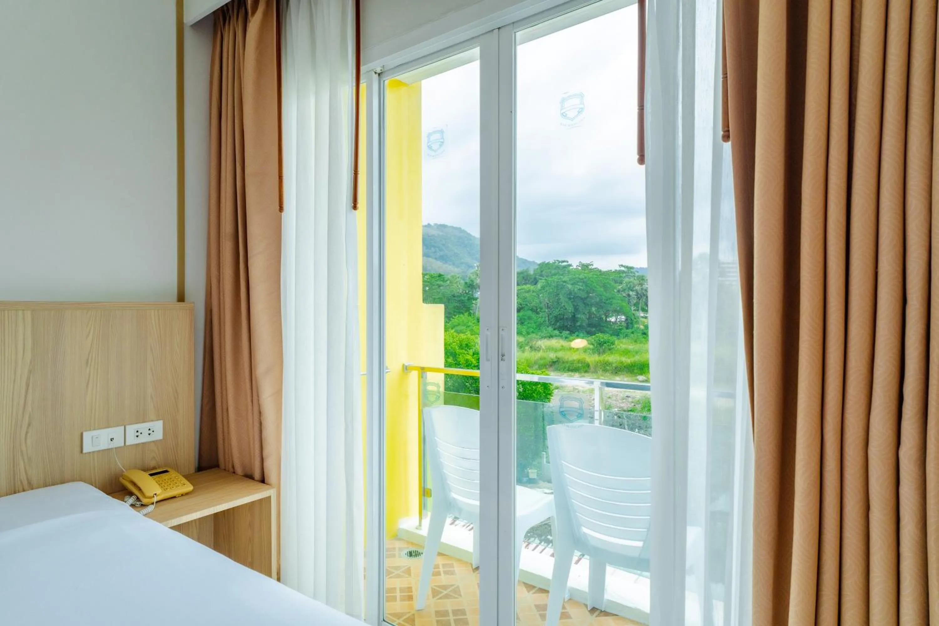 Balcony/Terrace, Bed in Baumancasa Beach Resort