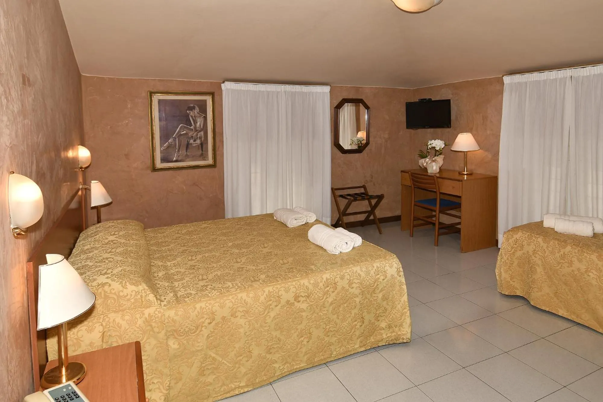 Bed in Hotel Innocenti