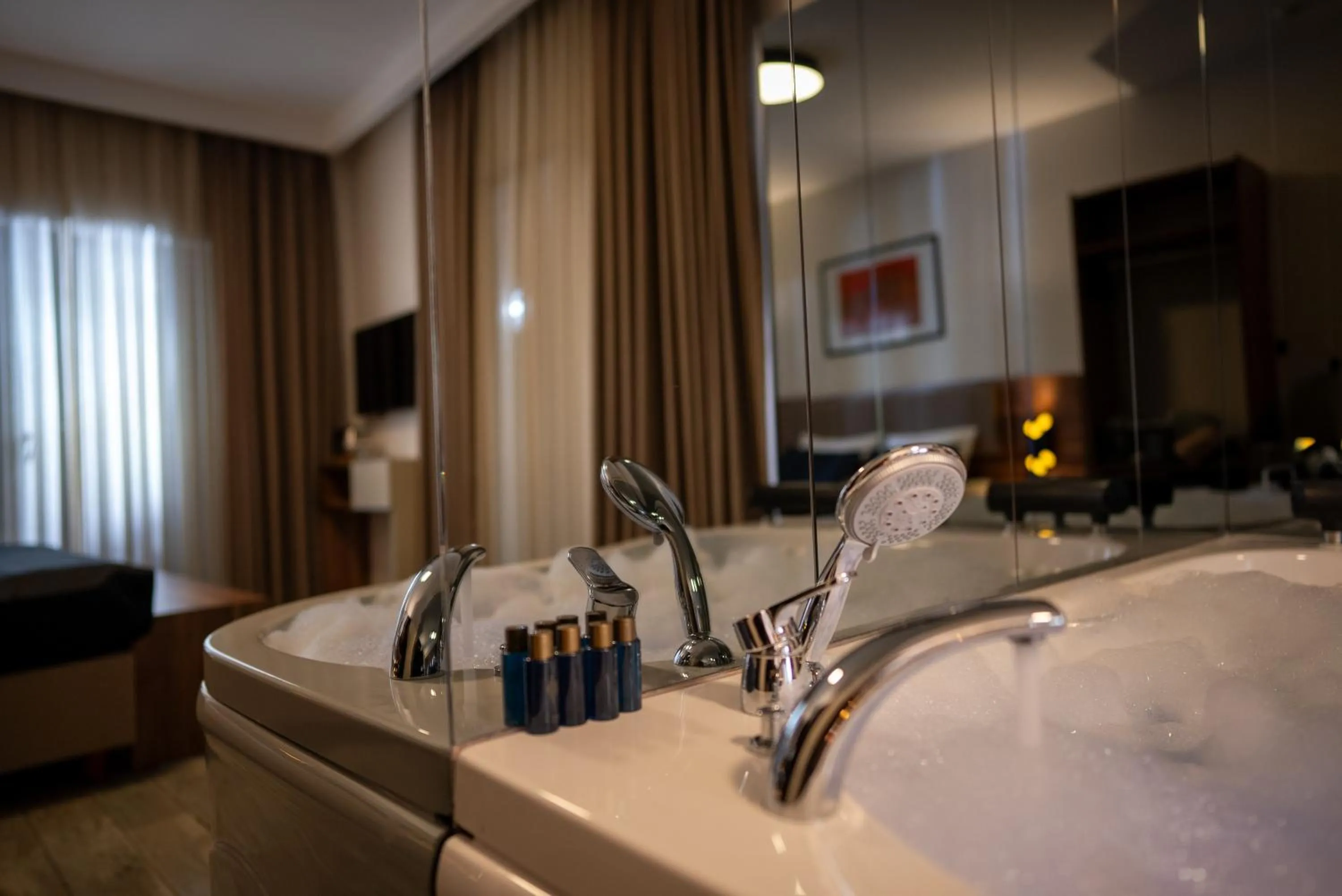 Bed in Mari Suites Hotel